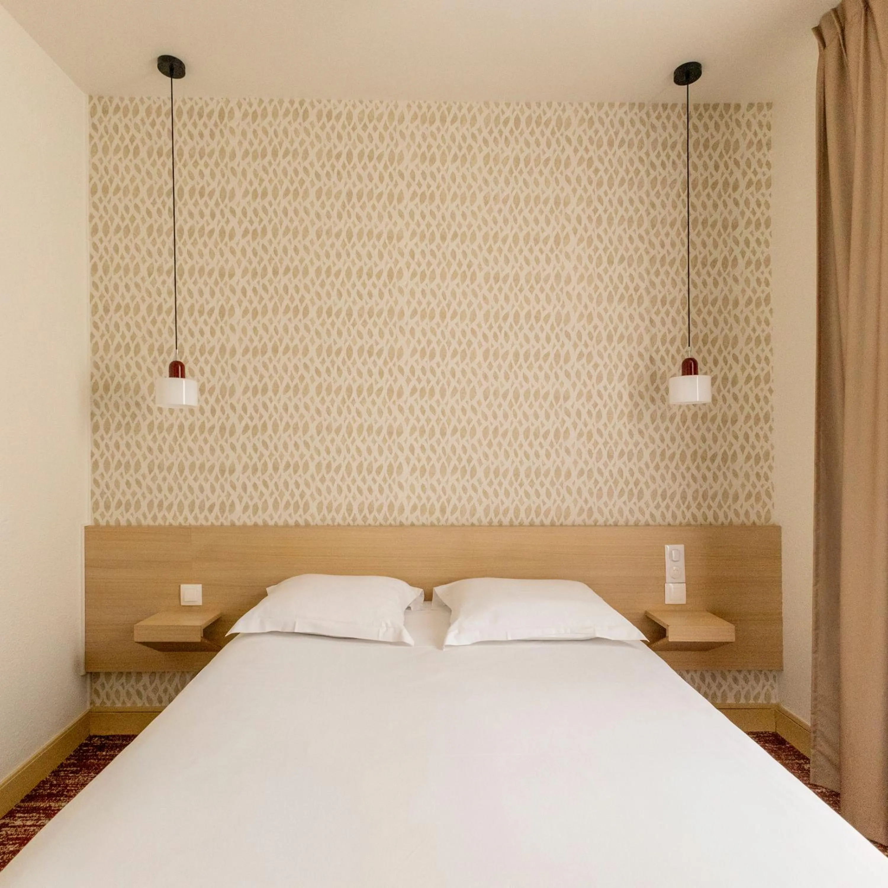 Bed in Hotel Gambetta