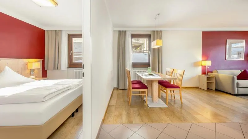 Dining area, Bed in Hapimag Saalbach