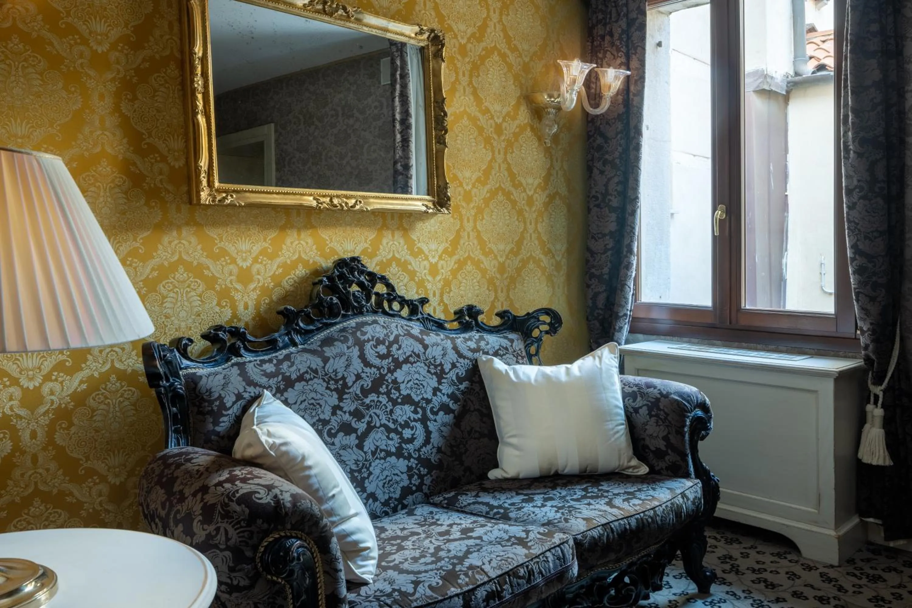 Communal lounge/ TV room in Residenza Venezia UNA Esperienze