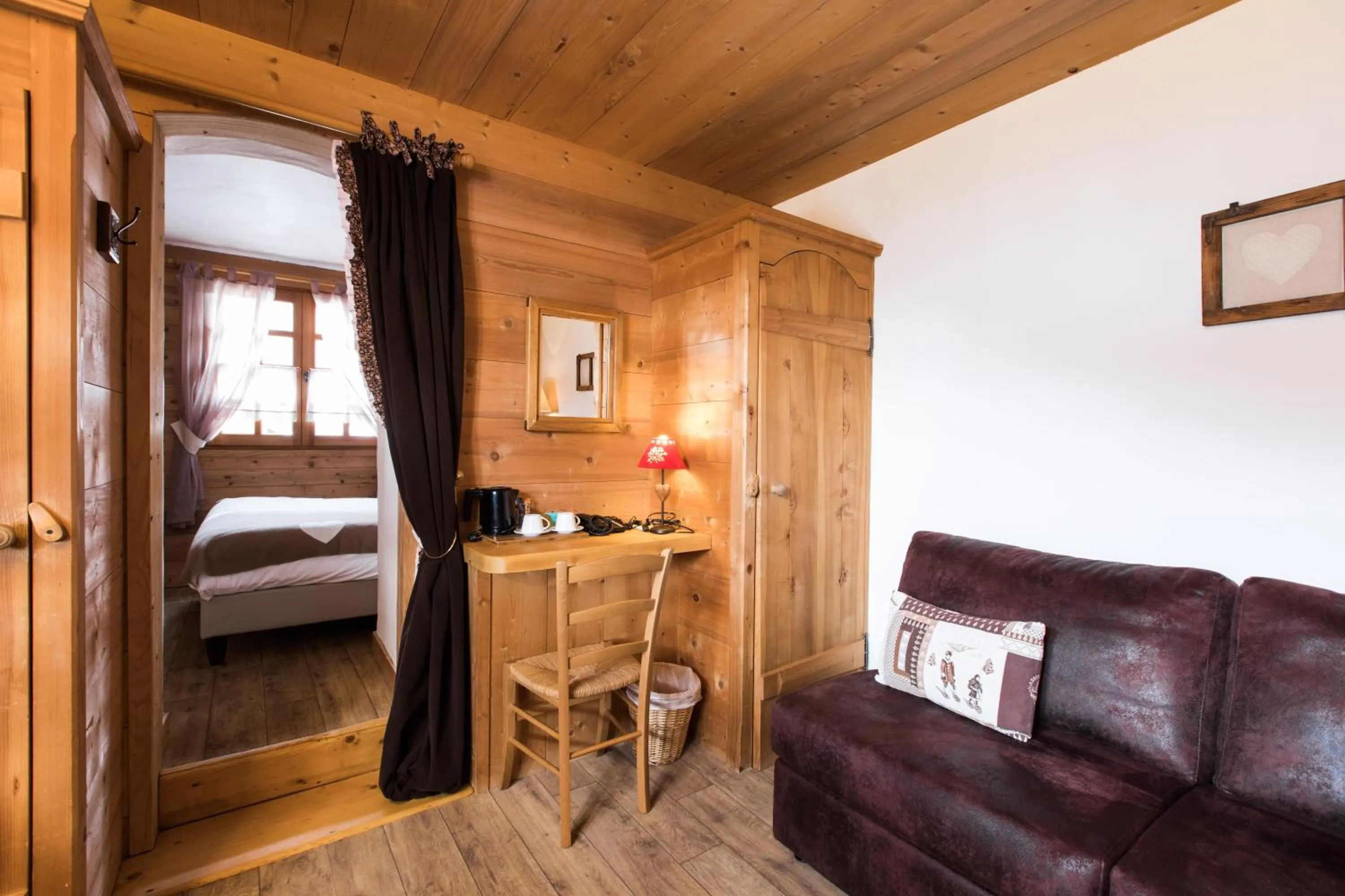 Living room, Bed in Les Chalets de La Griyotire