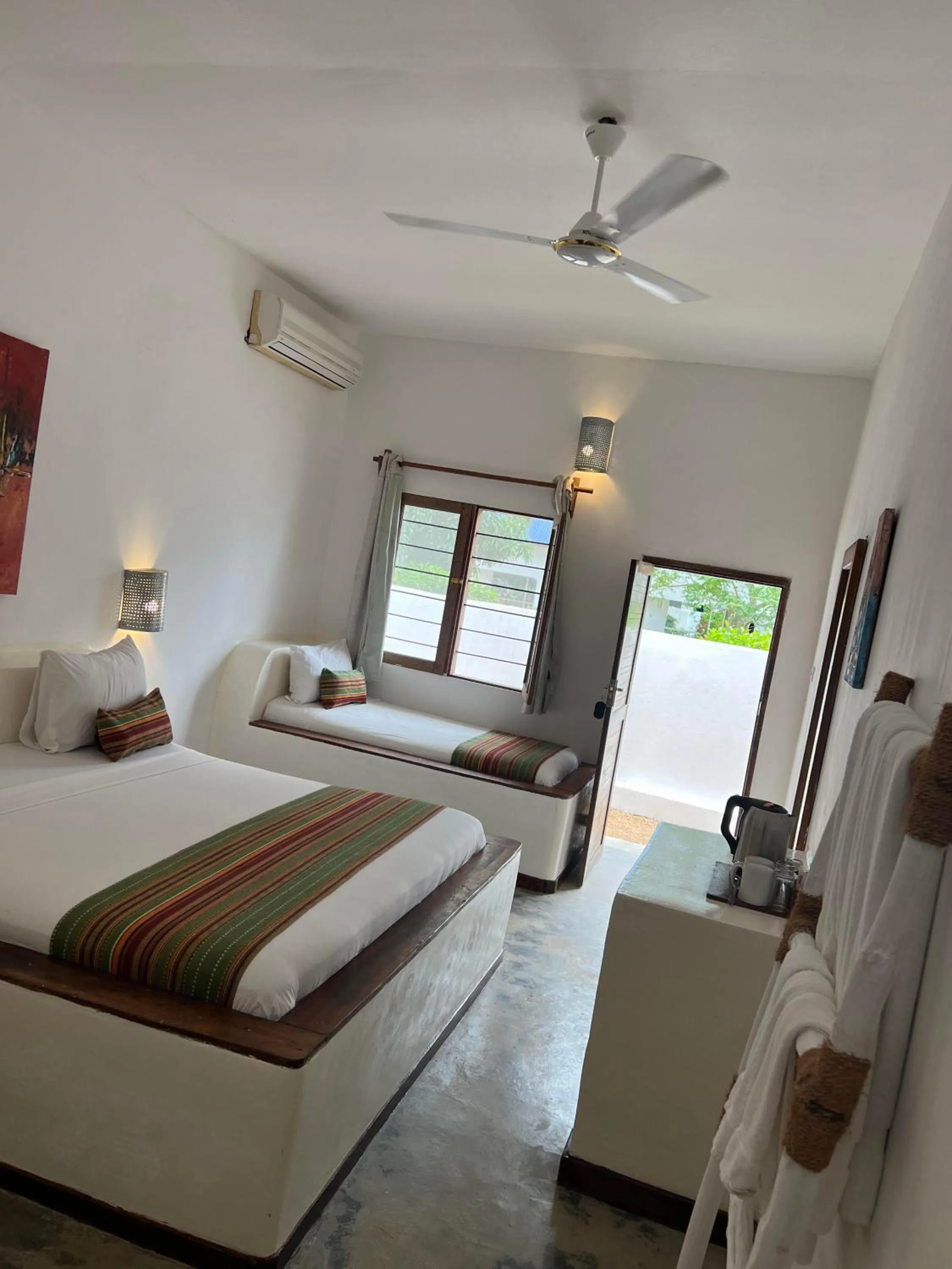 fireplace, Bed in Nungwi Getaway