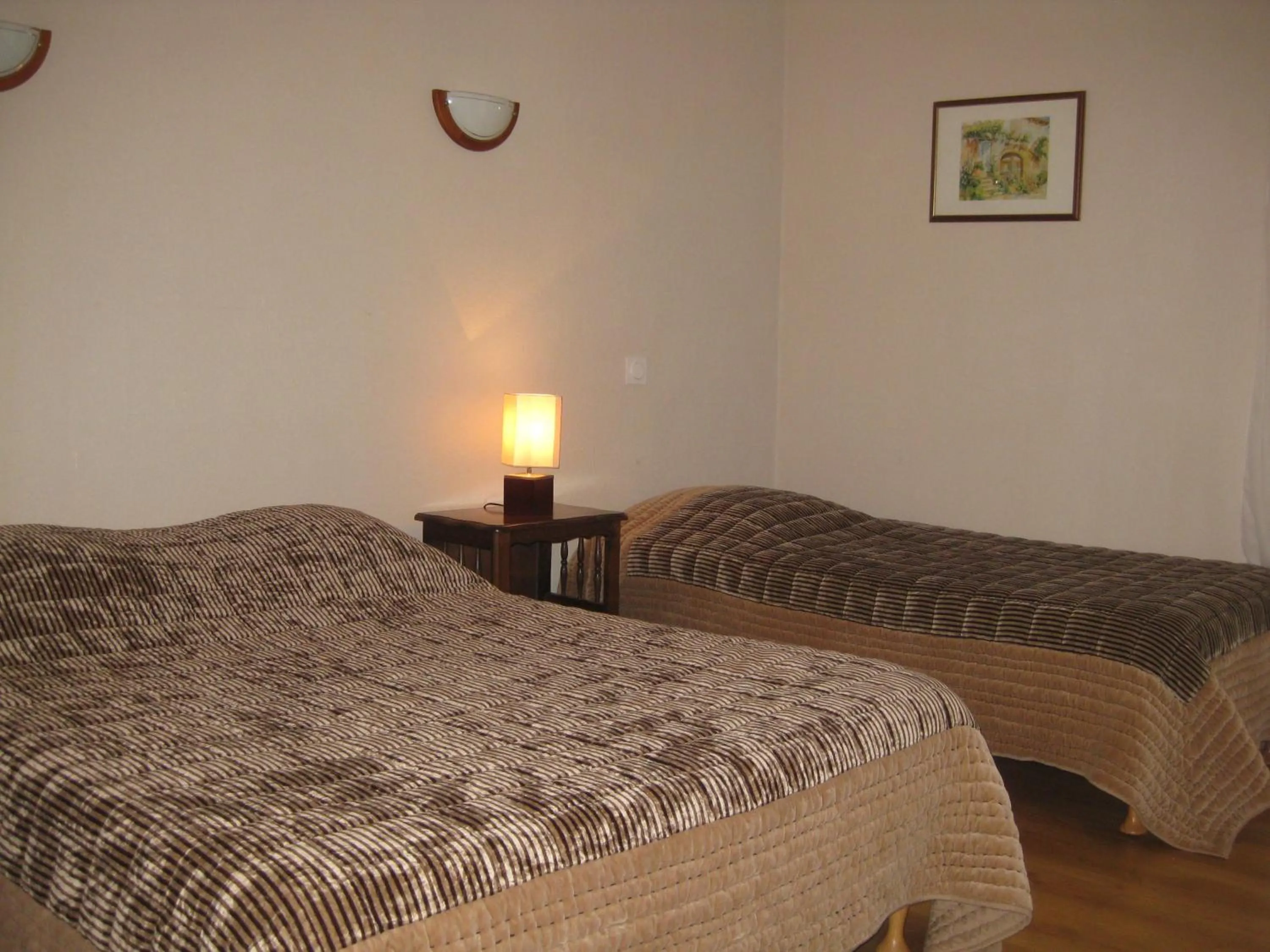 Bed in Hôtel Les Pavillons du Golf