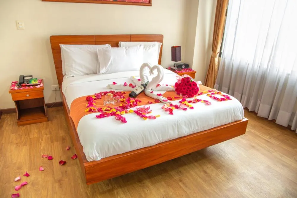 Bed in Hotel Splendor by Friends Company