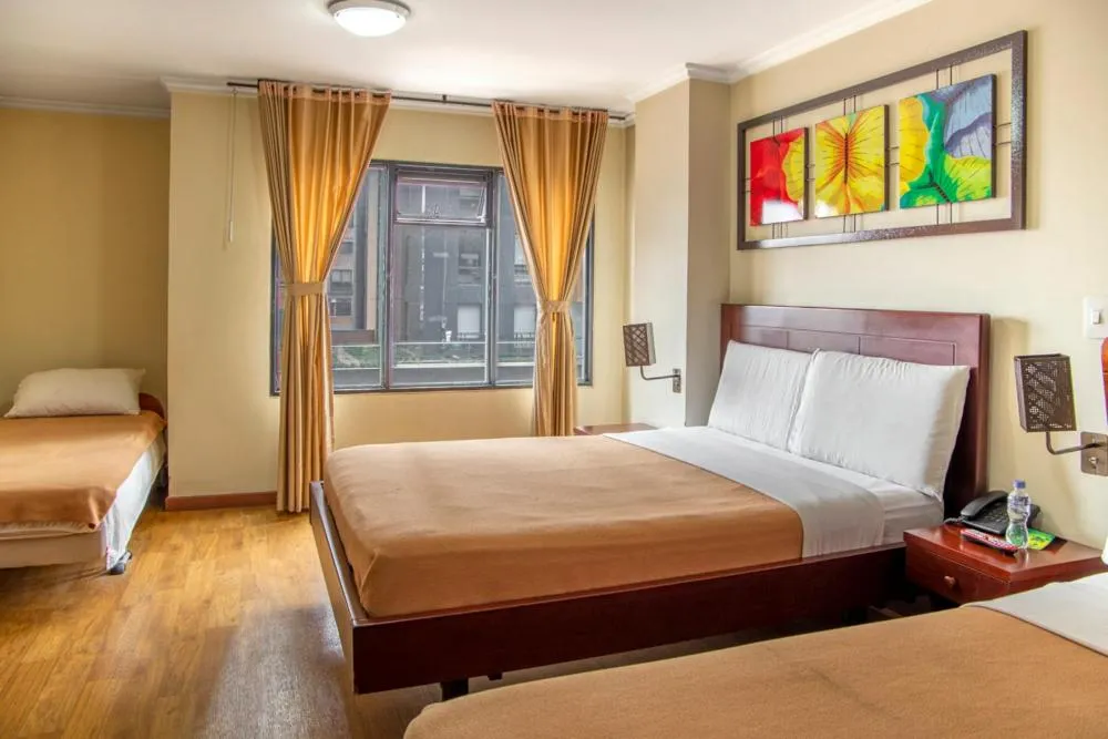 Bed in Hotel Splendor by Friends Company