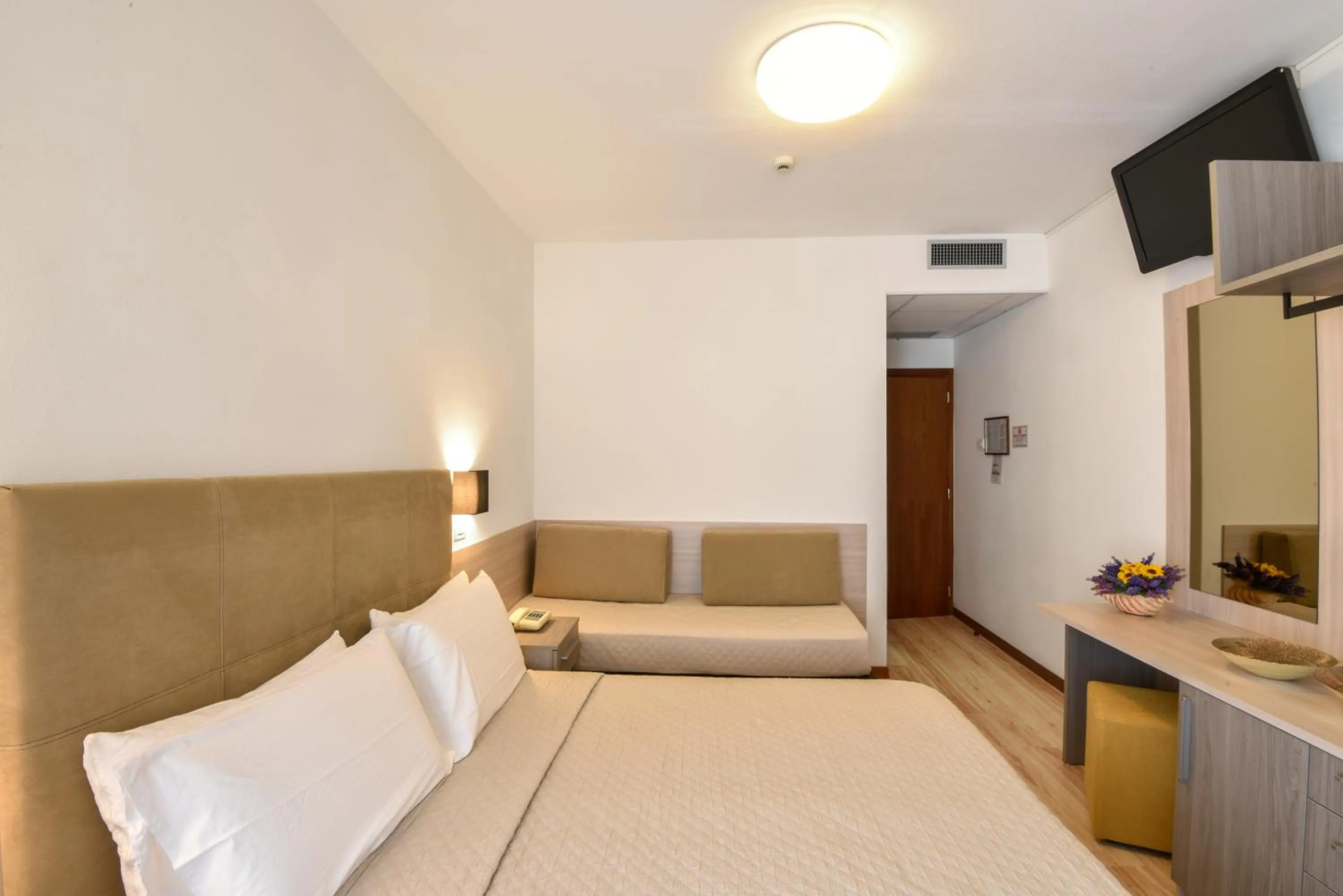 Bed in Hotel Excelsior