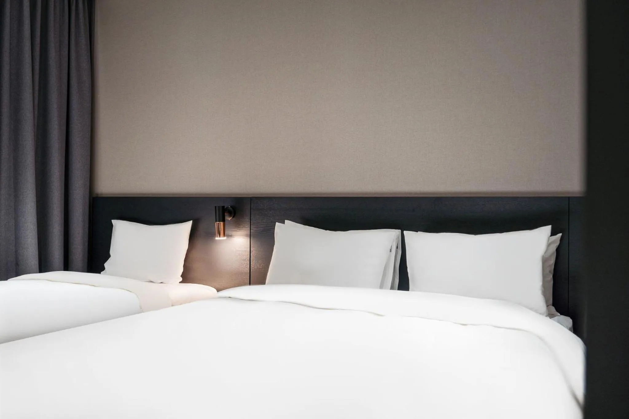 Bed in Rivertain Hotel Gyeongju