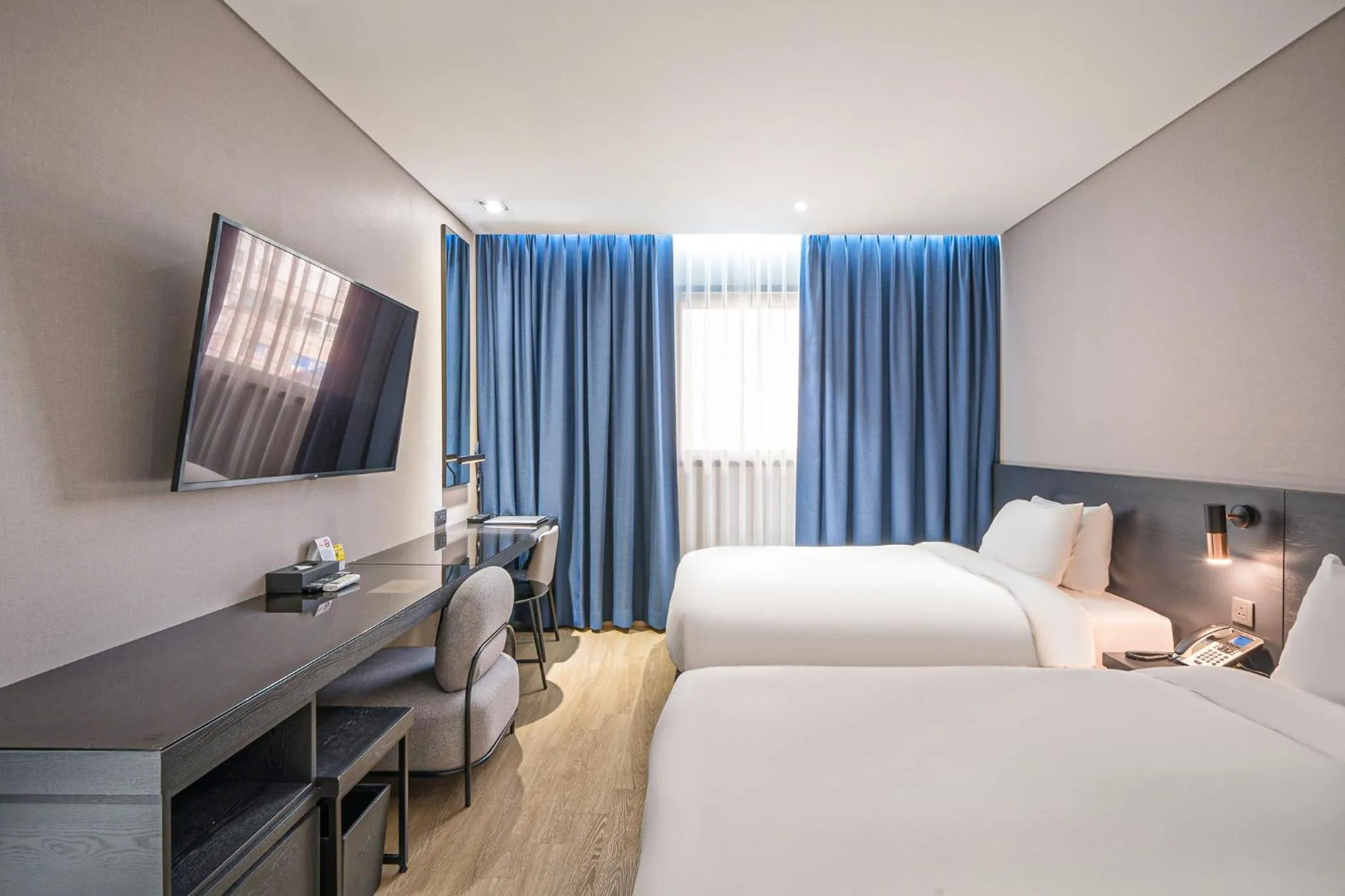 Bed in Rivertain Hotel Gyeongju