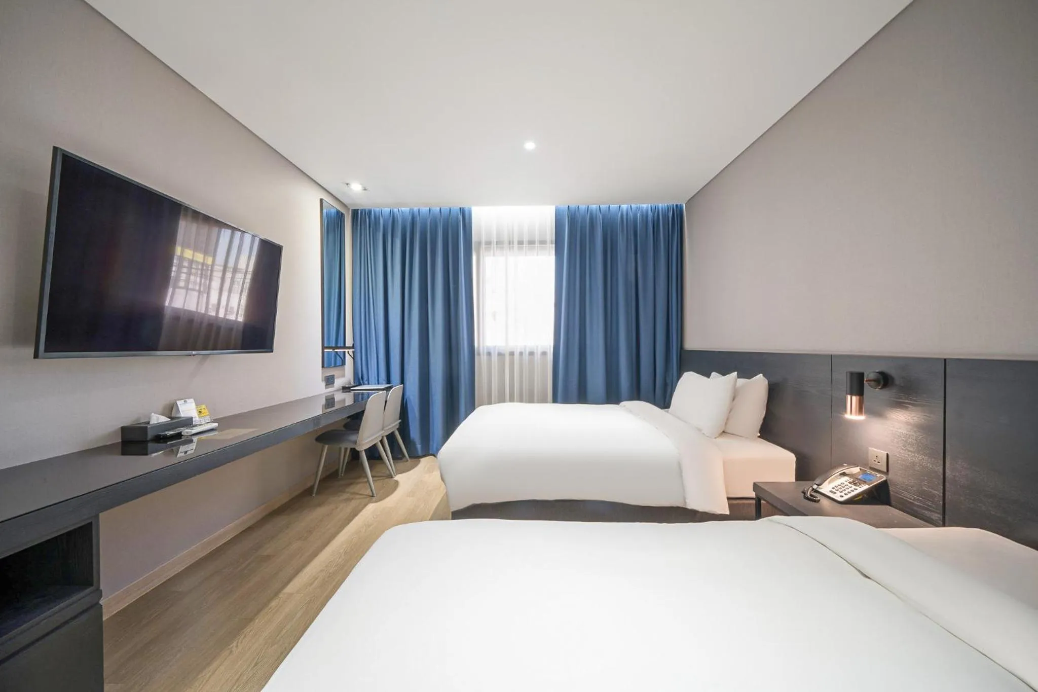 Bed in Rivertain Hotel Gyeongju