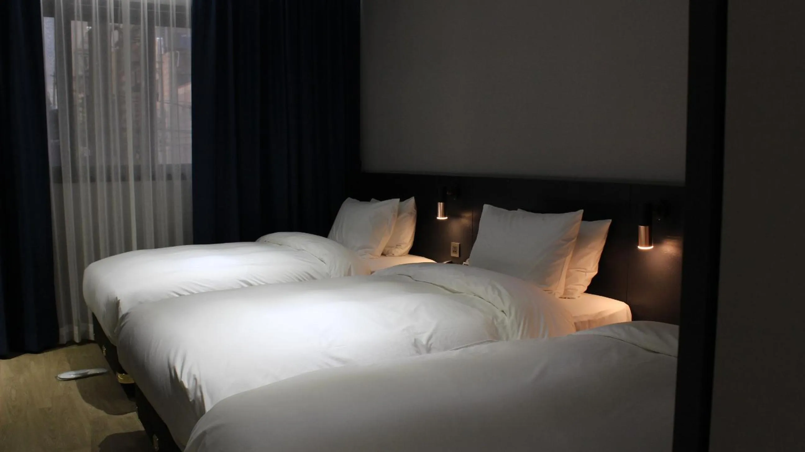 Bed in Rivertain Hotel Gyeongju