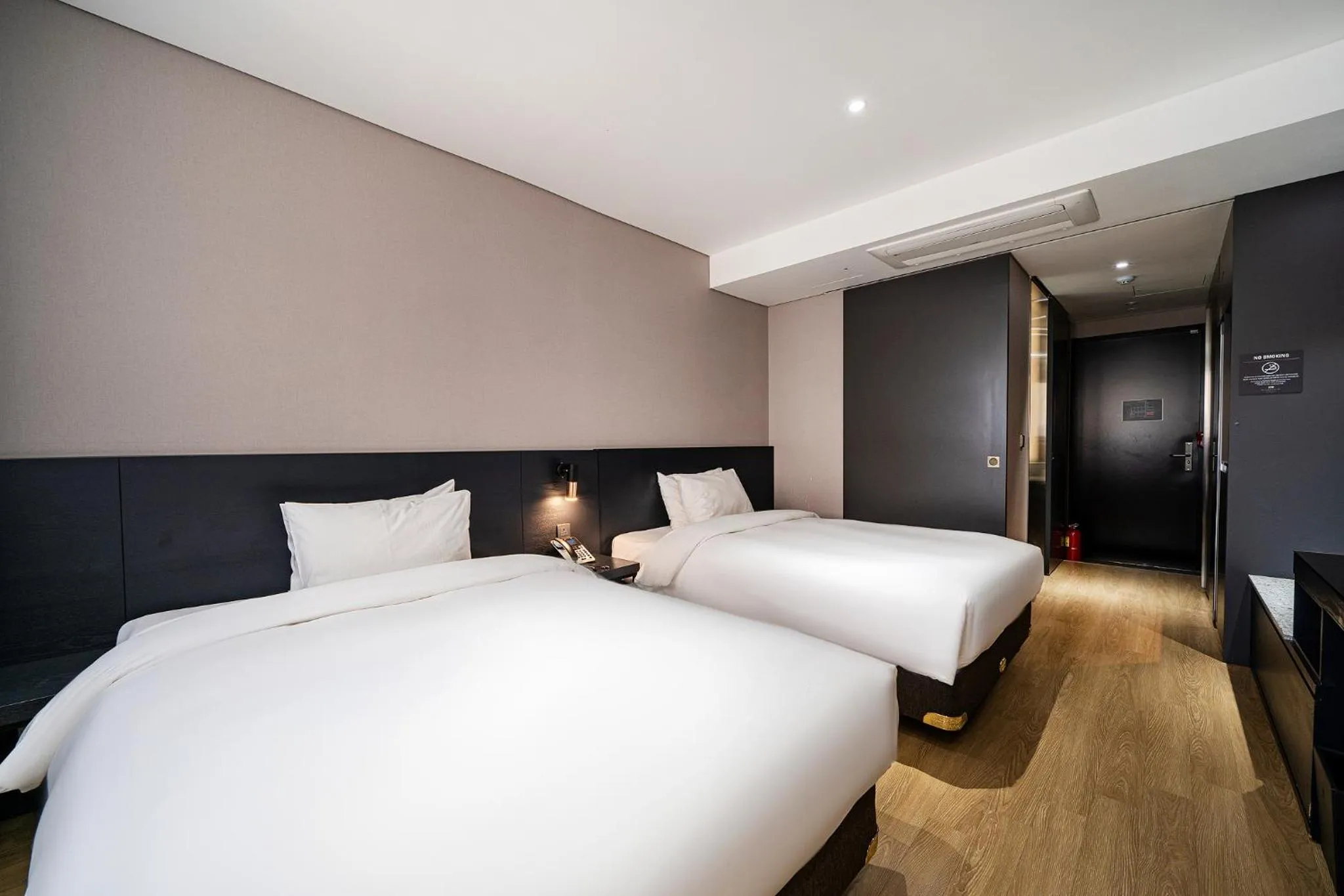 Bed in Rivertain Hotel Gyeongju