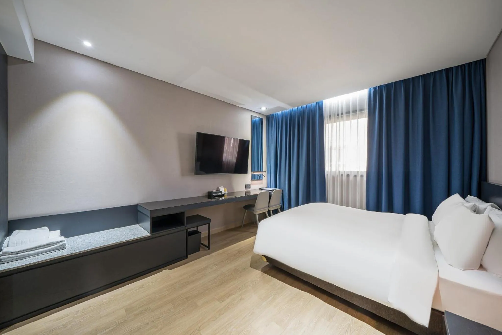 Bed in Rivertain Hotel Gyeongju