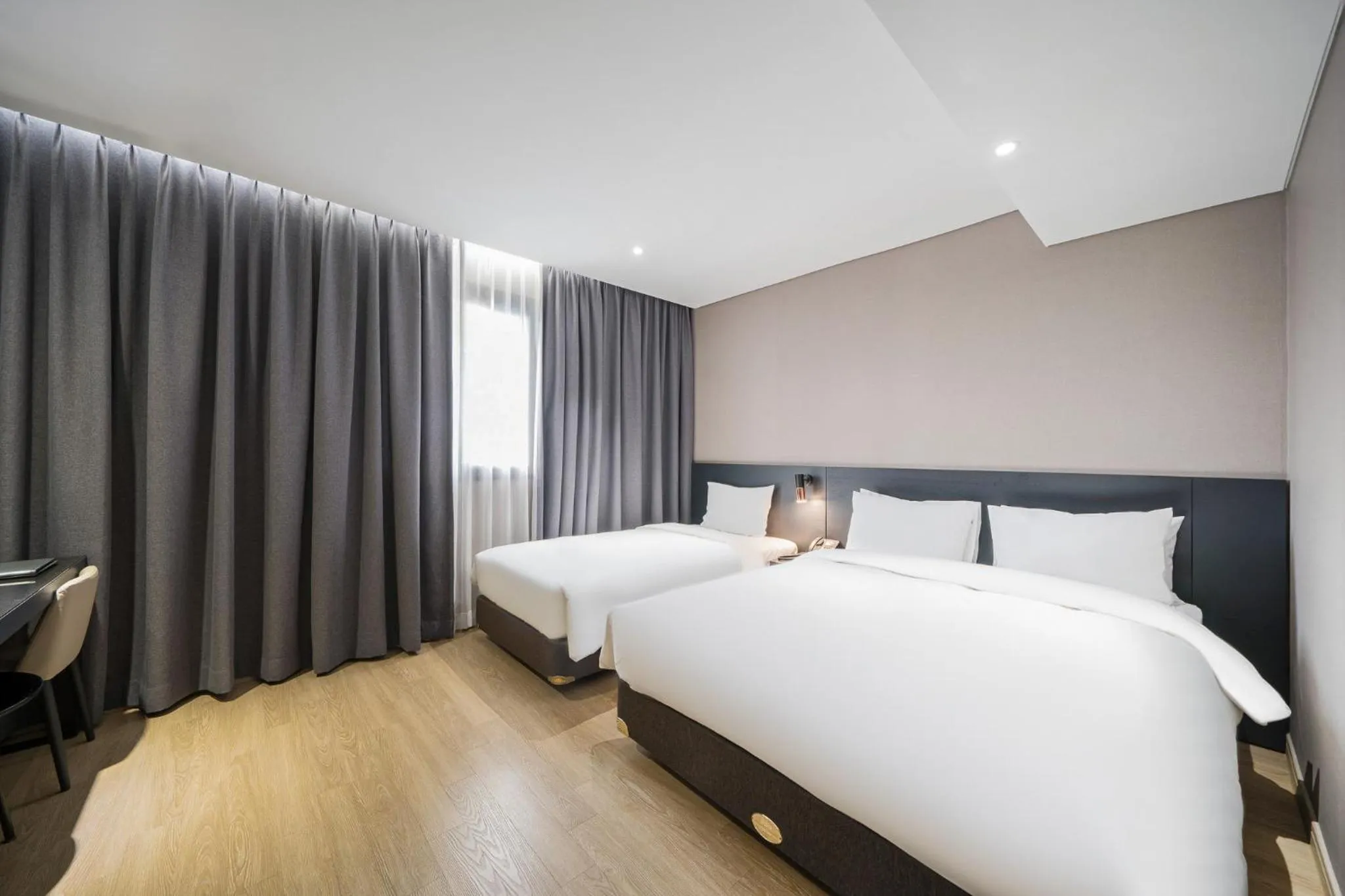 Bed in Rivertain Hotel Gyeongju