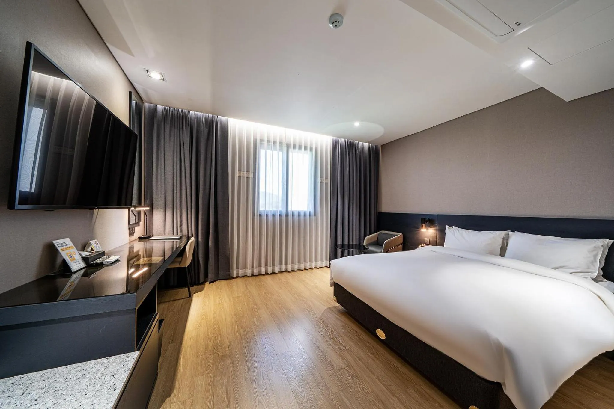 Bed in Rivertain Hotel Gyeongju