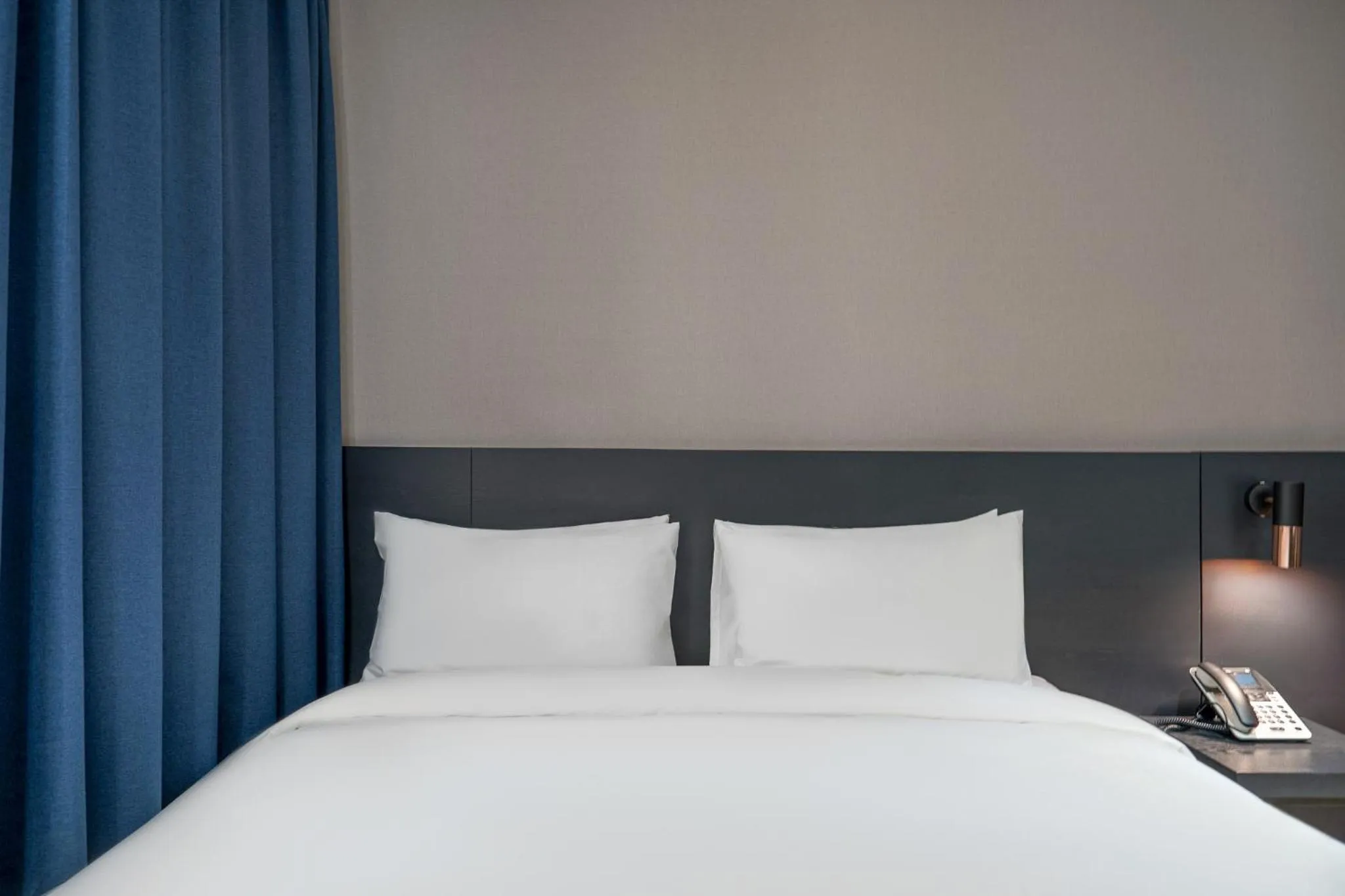 Bed in Rivertain Hotel Gyeongju