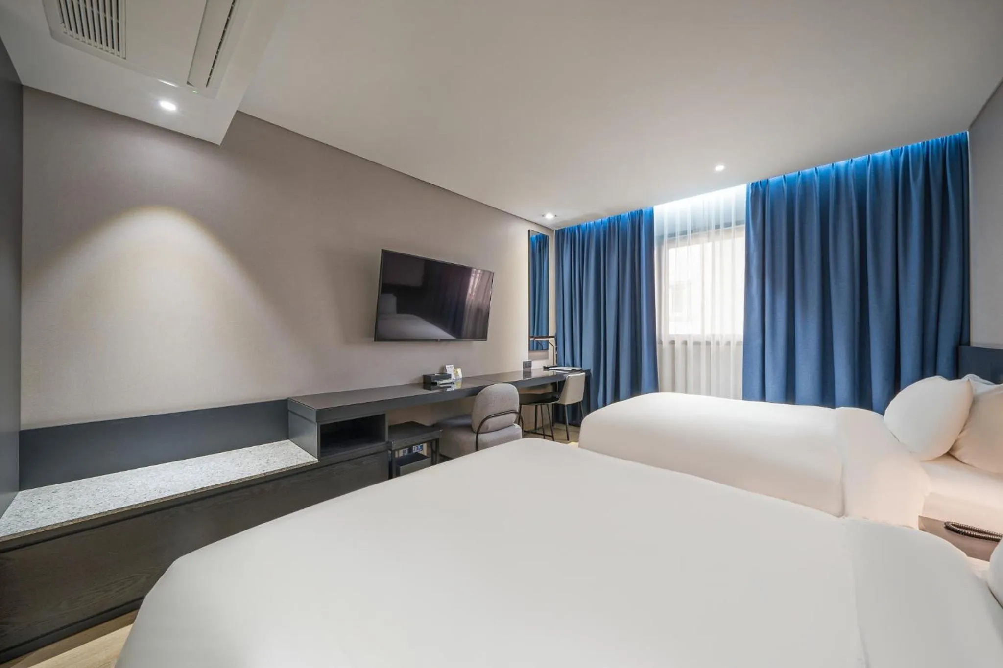Bed in Rivertain Hotel Gyeongju