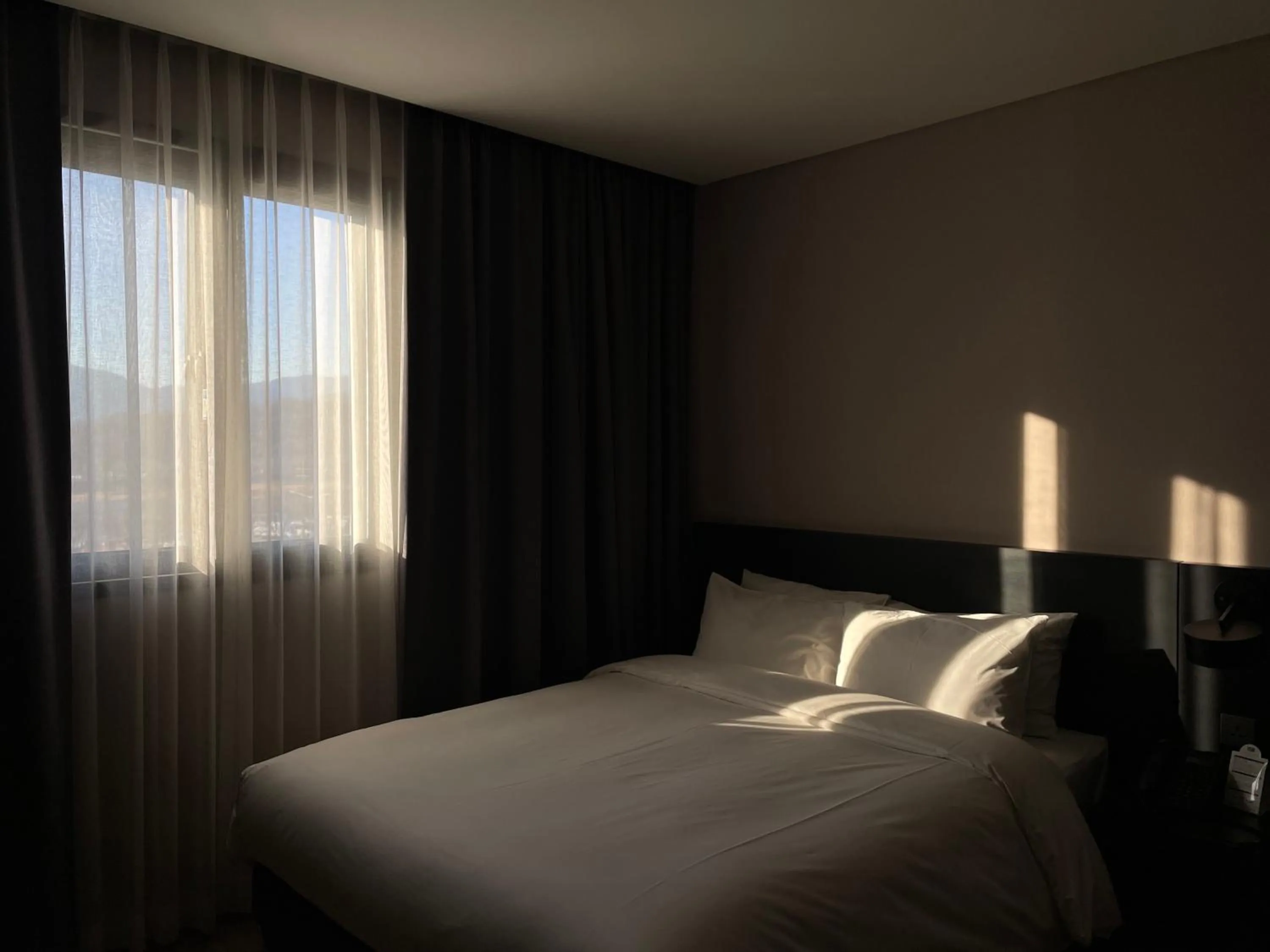 Bed in Rivertain Hotel Gyeongju