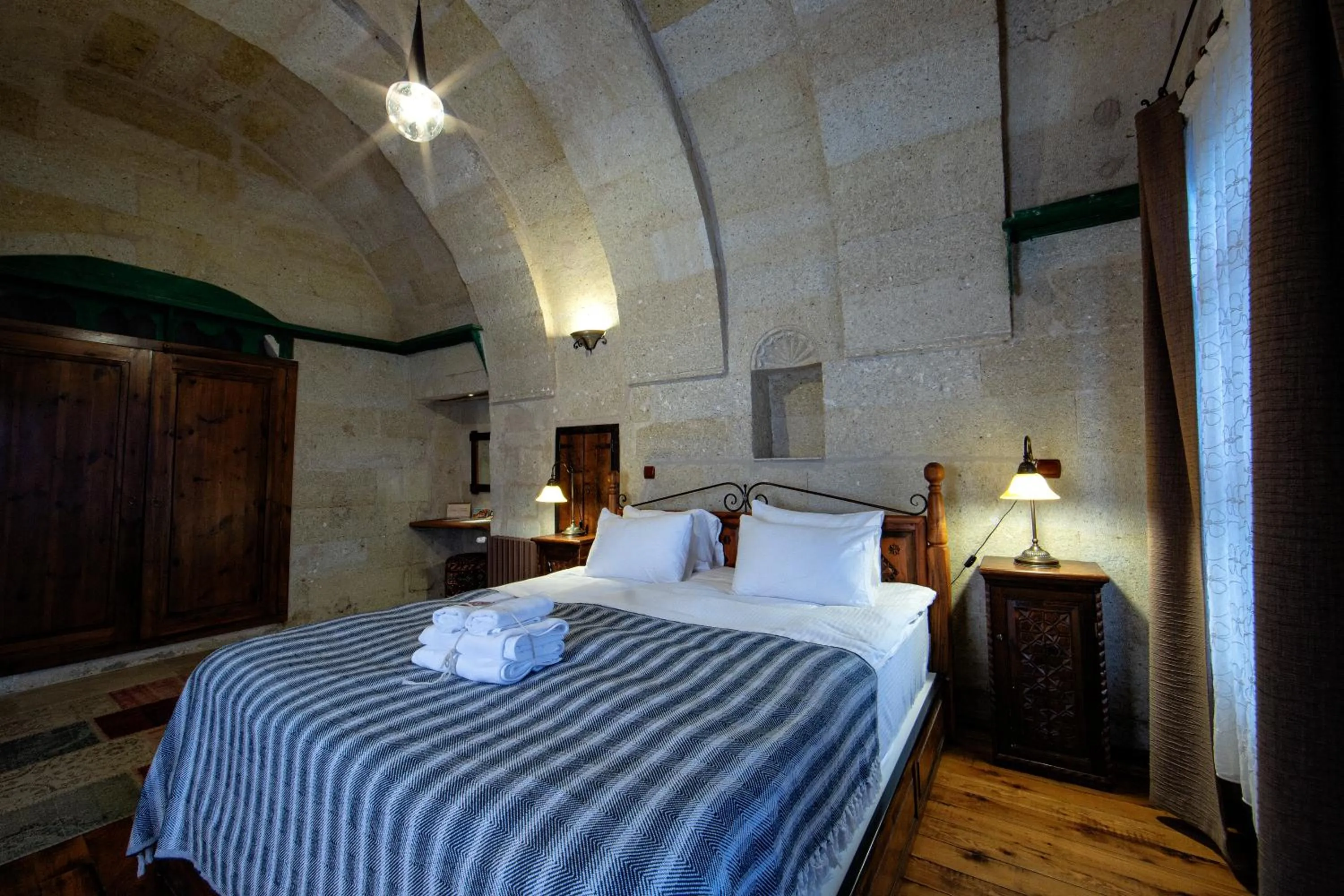 Bed in Aza Cave Cappadocia Adult Hotel