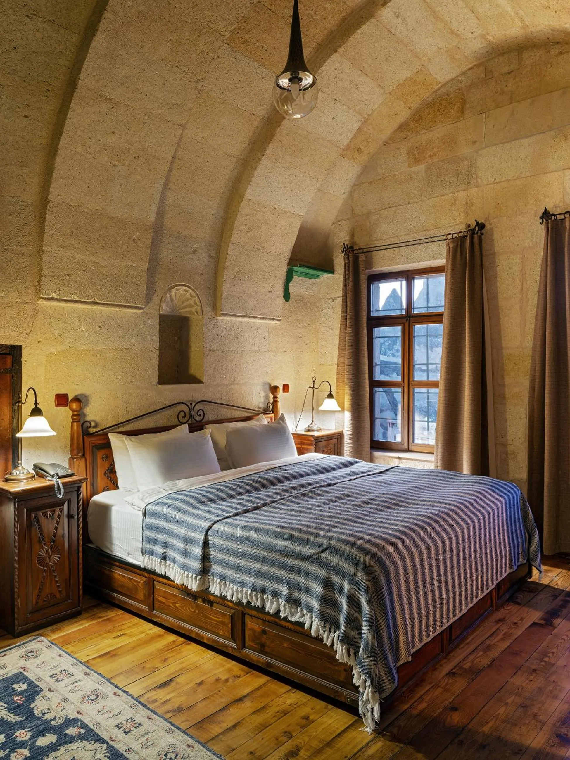 Bed in Aza Cave Cappadocia Adult Hotel