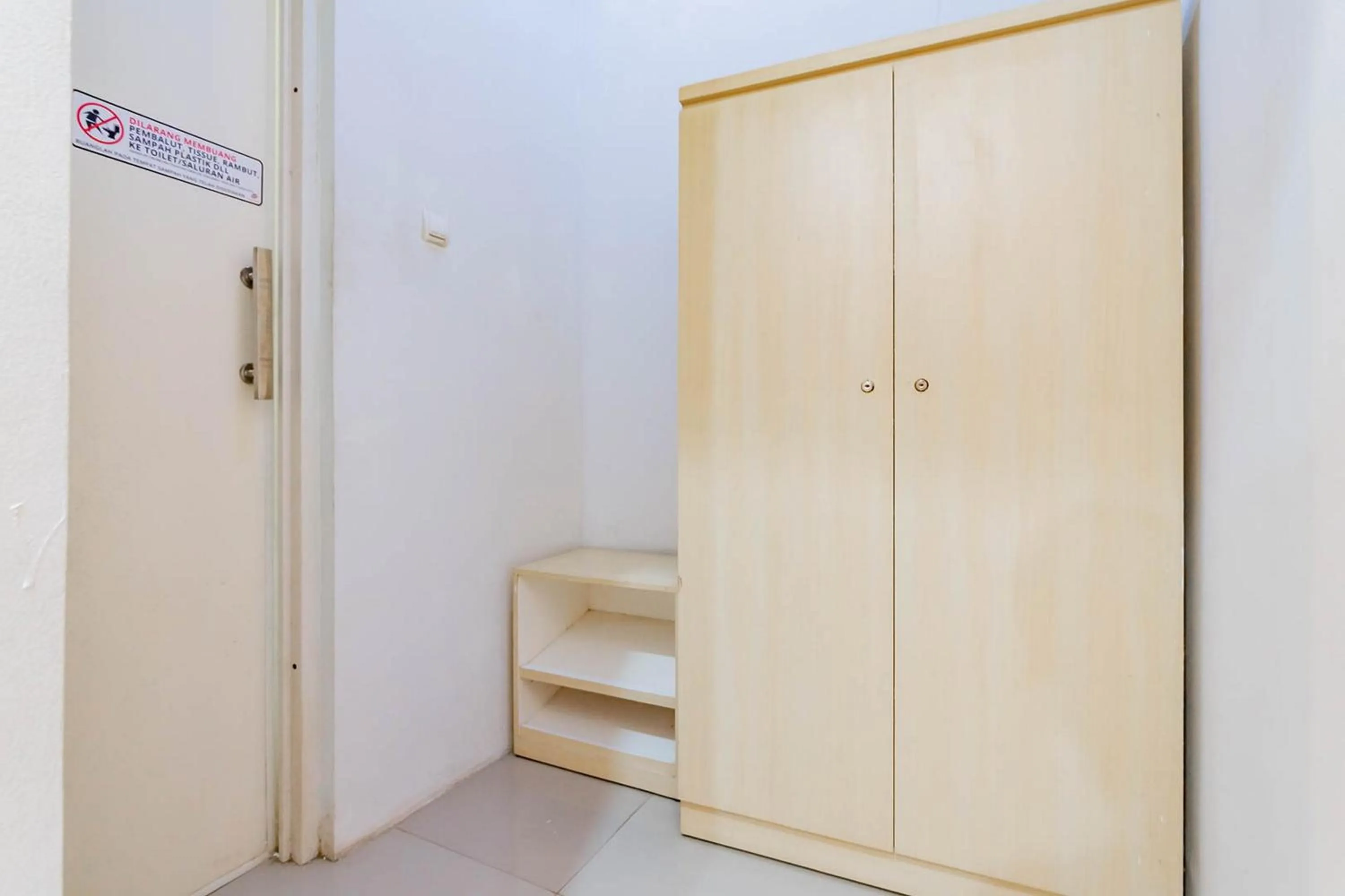 Bedroom in Urbanview Hotel One Family Maribaya by RedDoorz