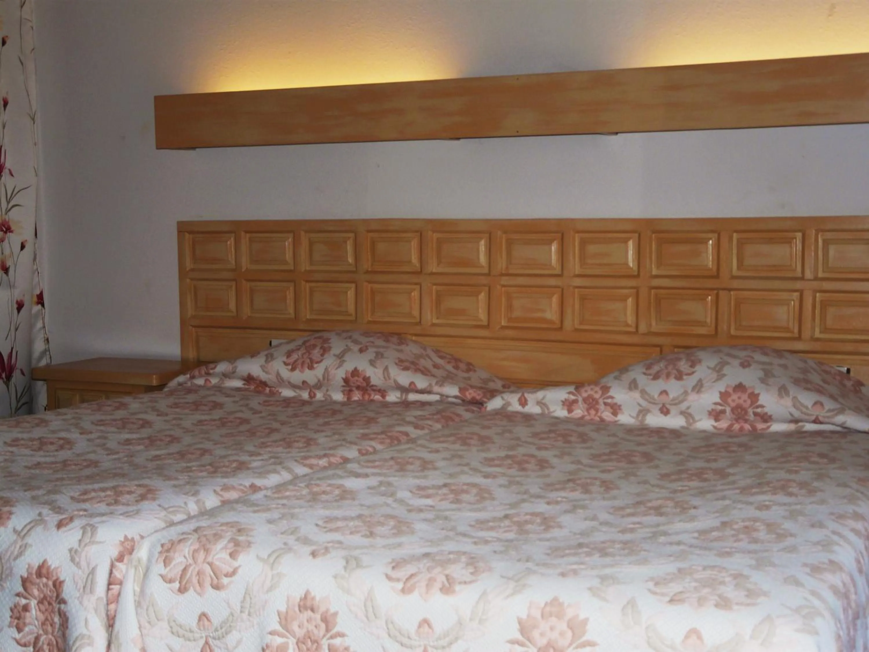 Bed in Hotel Le Mas Fleuri