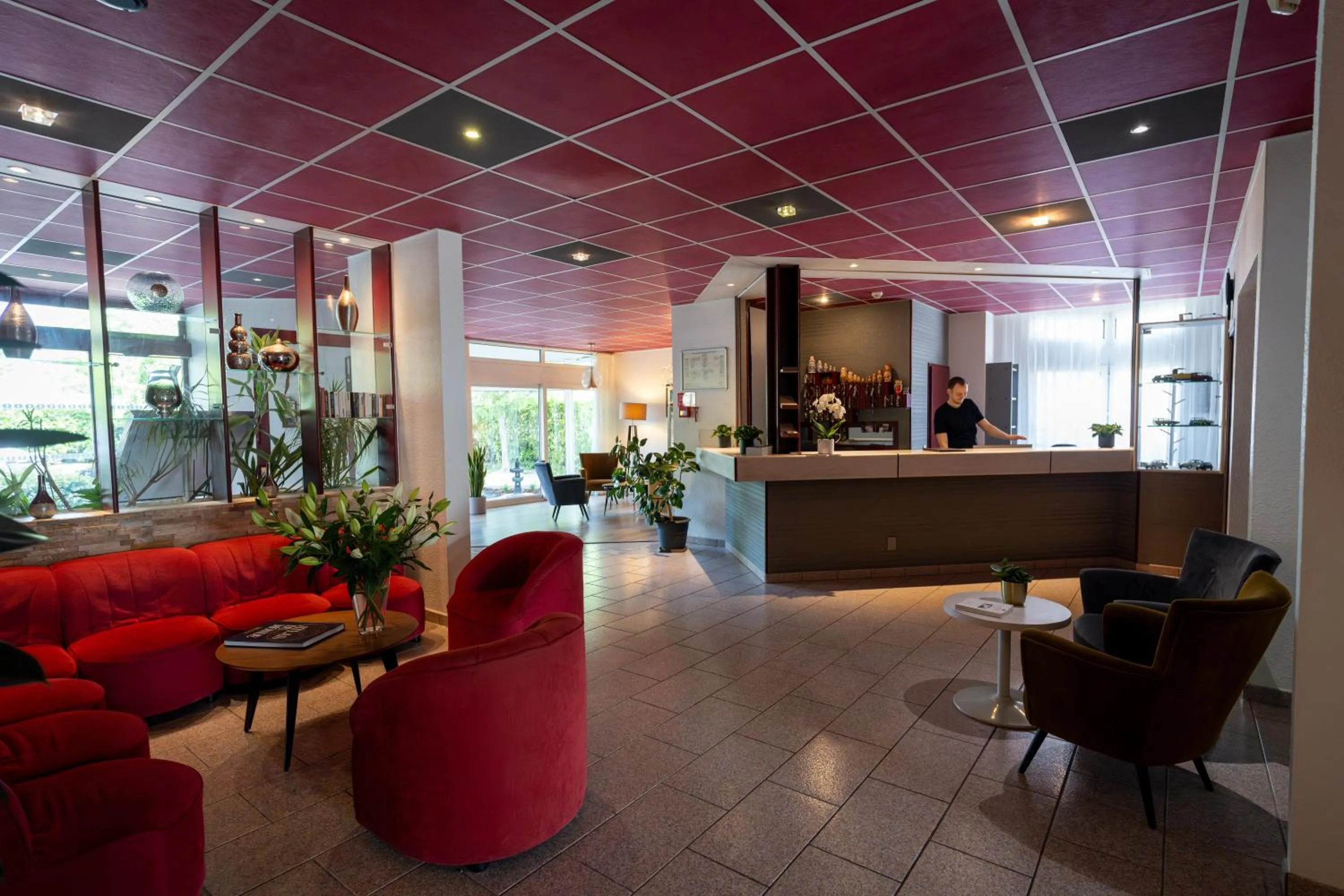 Living room in Logis Hotel Arc En Ciel