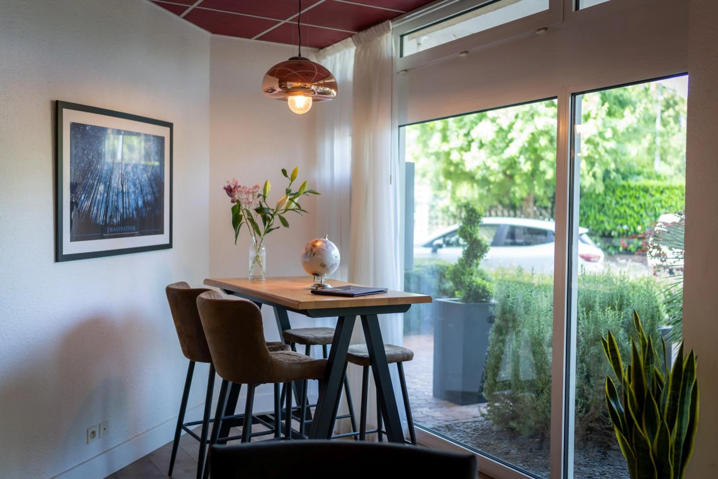 Seating area in Logis Hotel Arc En Ciel