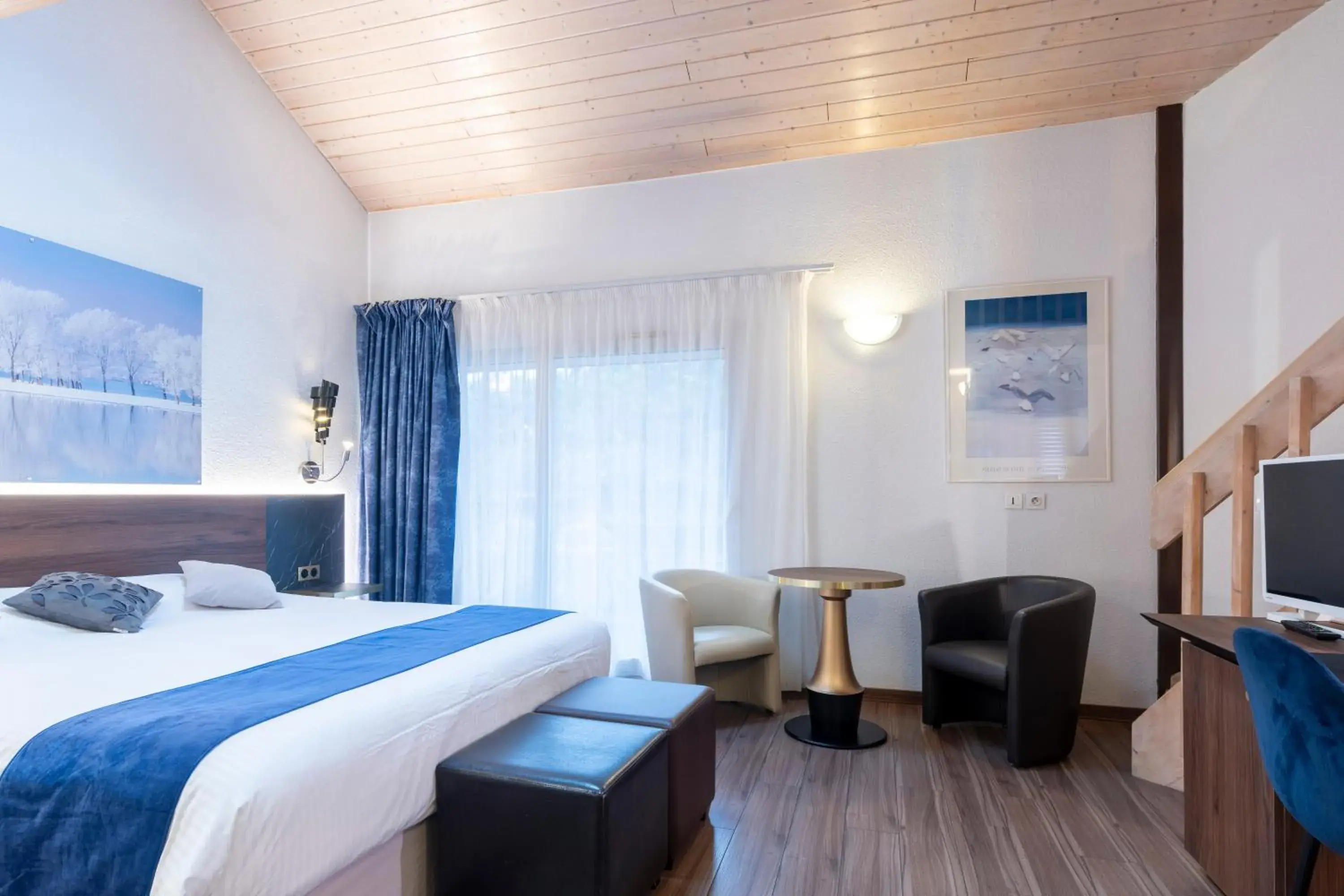 Comfort Quadruple Room in Logis Hotel Arc En Ciel Comfort Quadruple Room in Logis Hotel Arc En Ciel