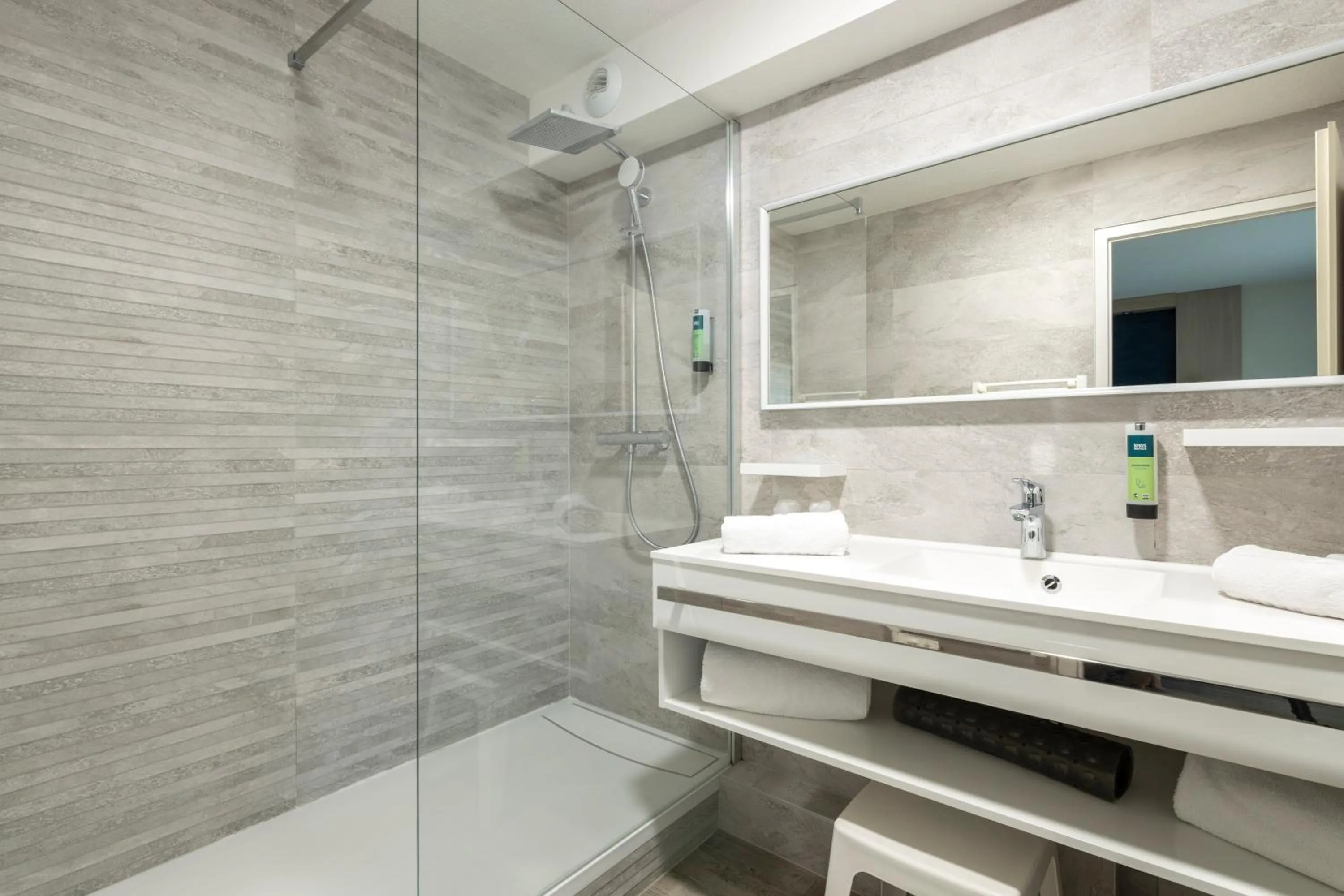 Shower in Logis Hotel Arc En Ciel