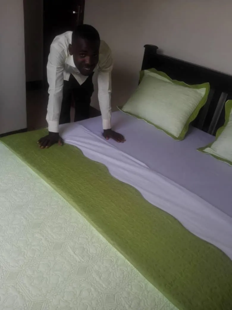 Staff, Bed in Coffee Tourist Motel