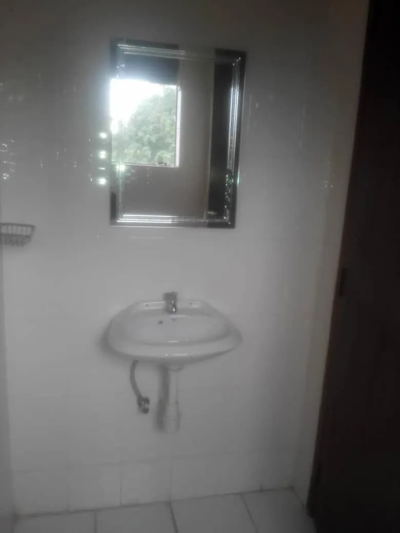 Bathroom in Coffee Tourist Motel