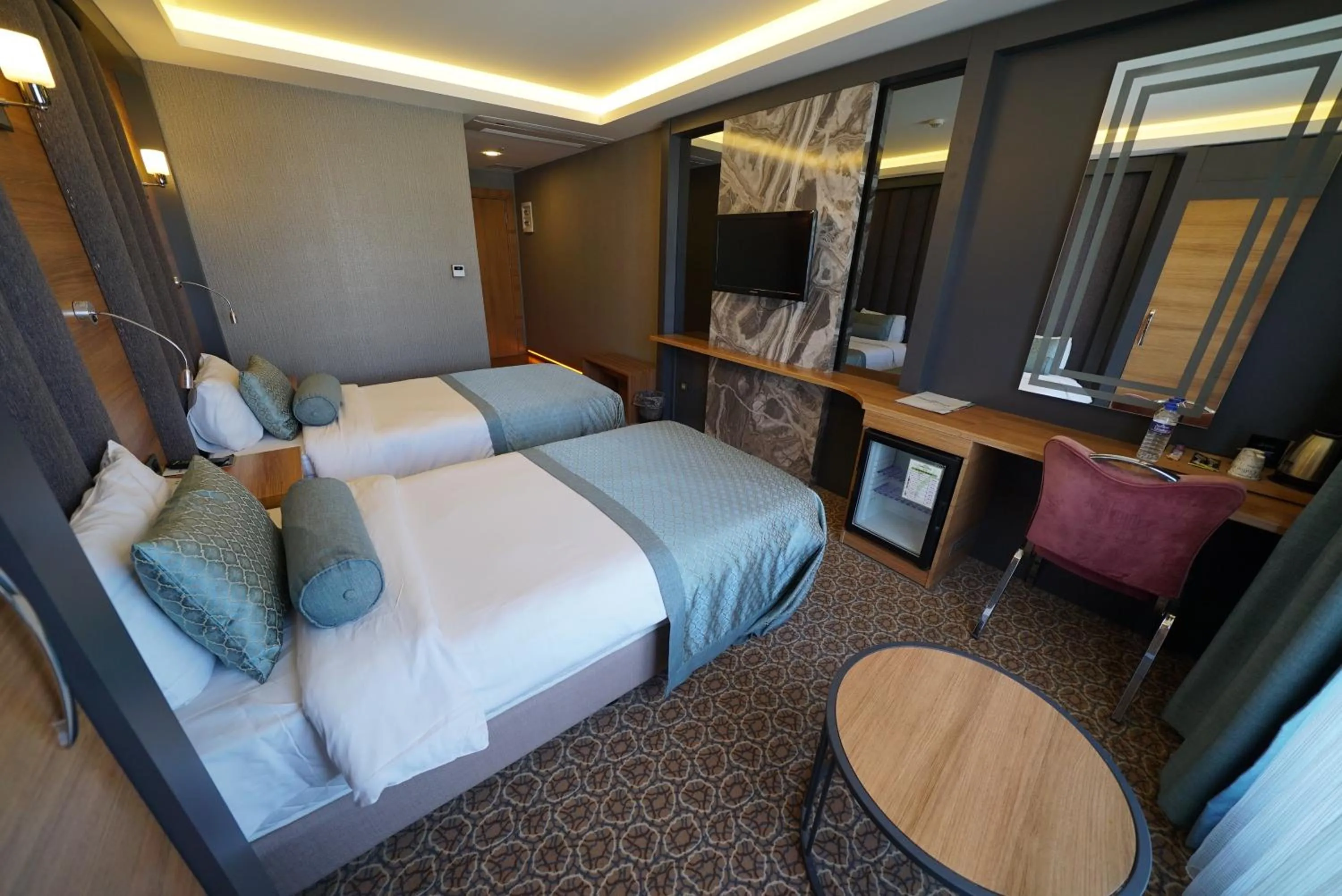 Bed in Green Prusa Hotel