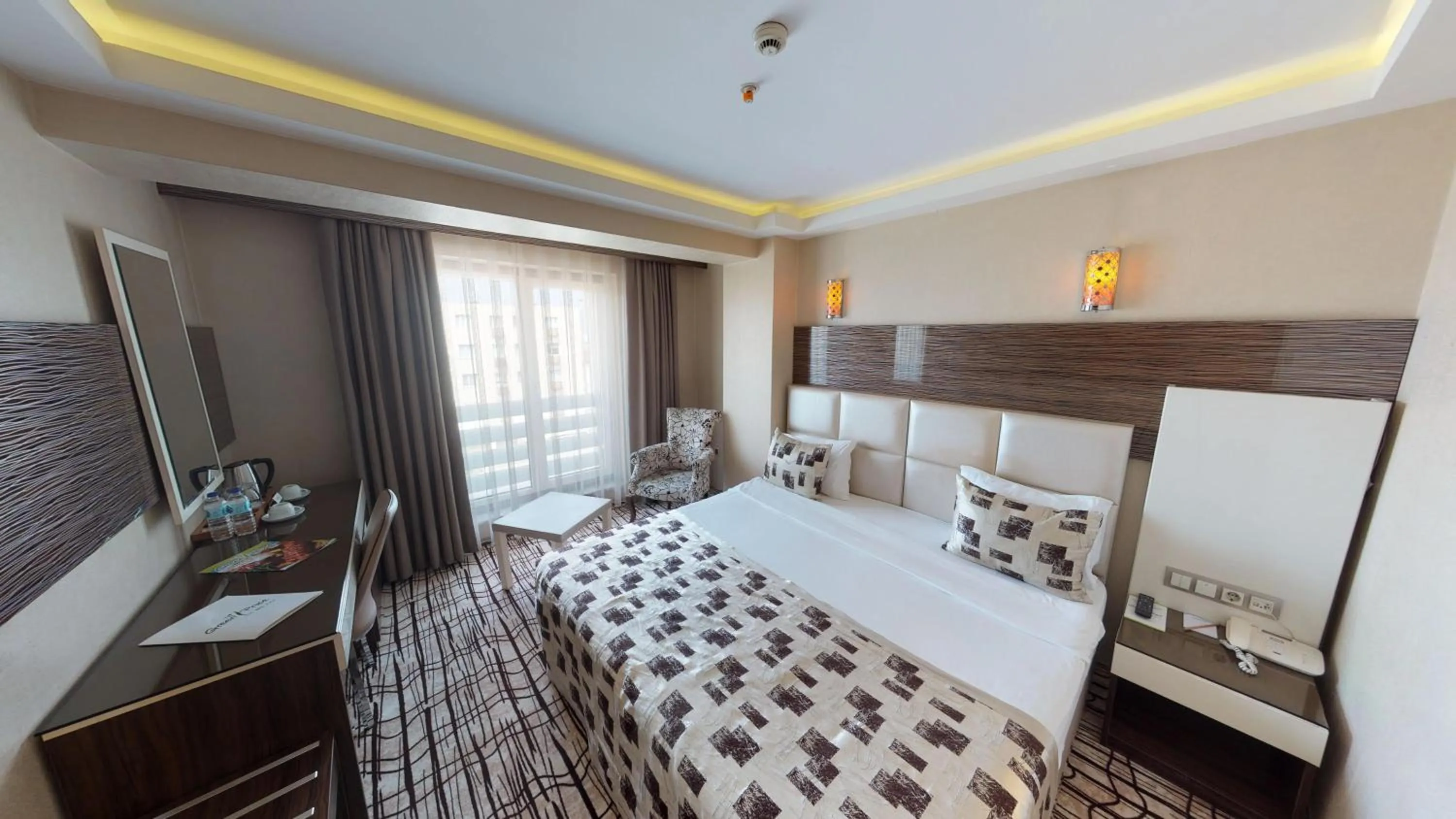 Bed in Green Prusa Hotel