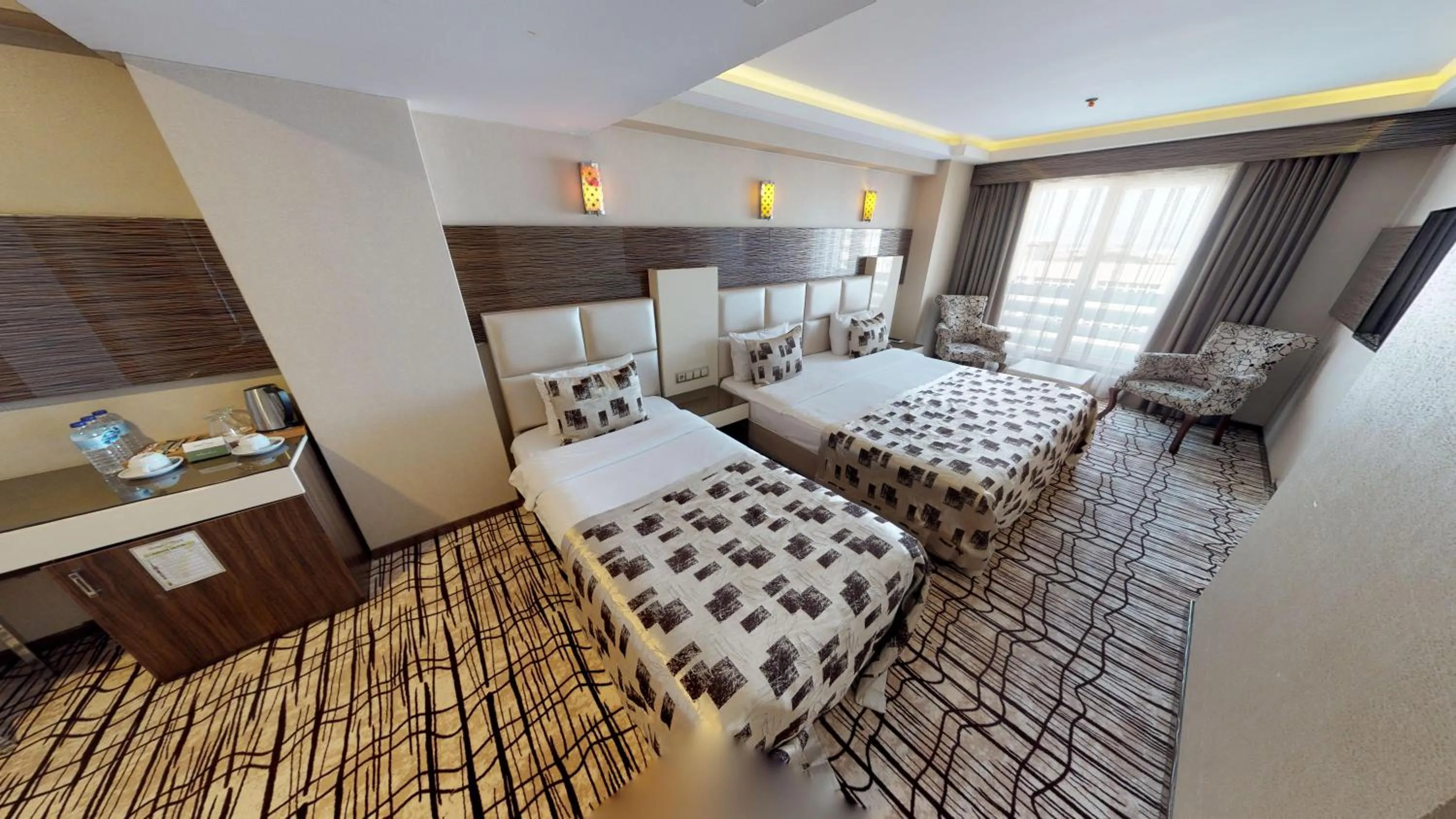 Bed in Green Prusa Hotel