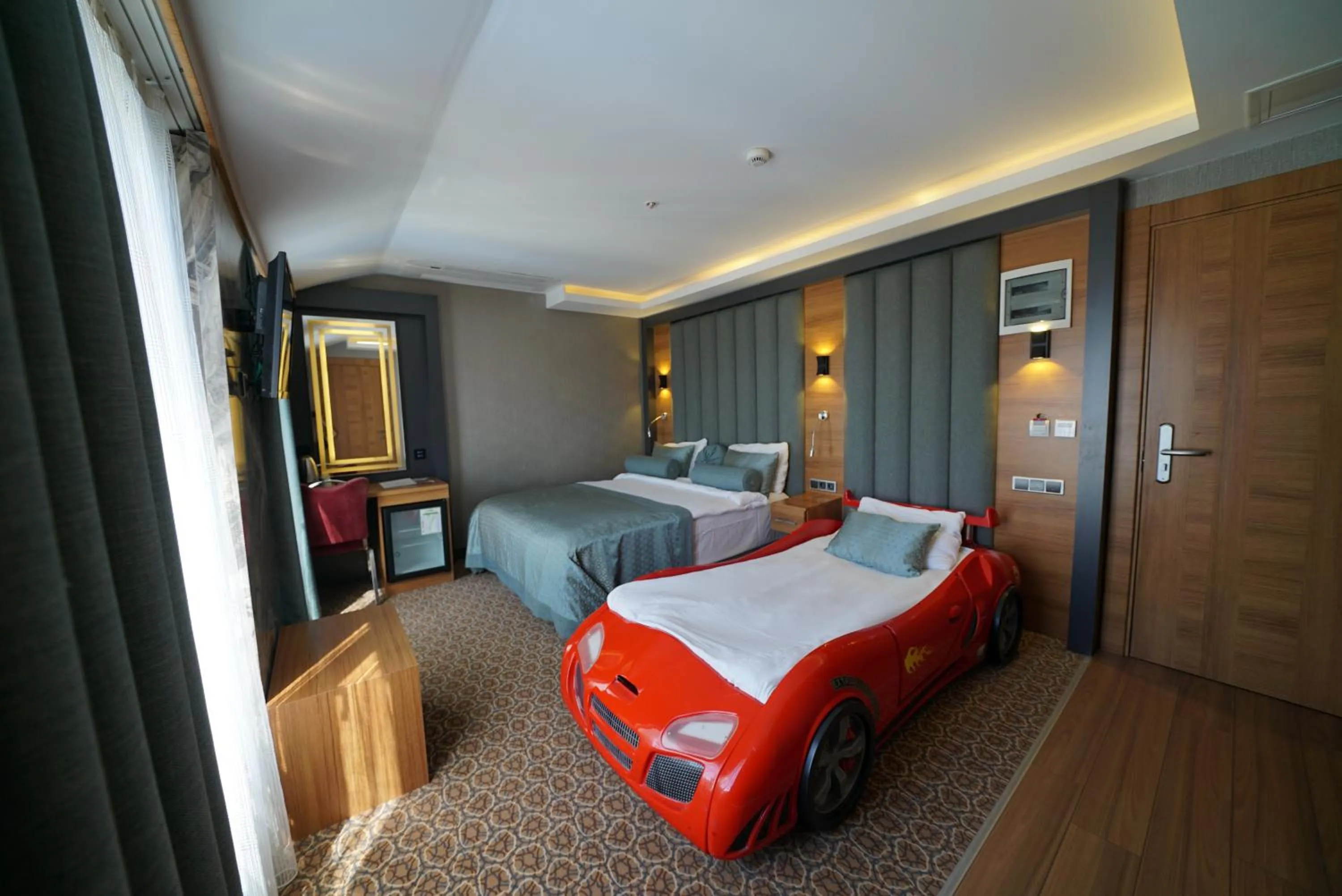 Bed in Green Prusa Hotel