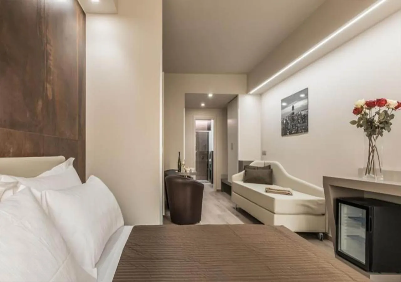 Bed in Astoria Deluxe rooms