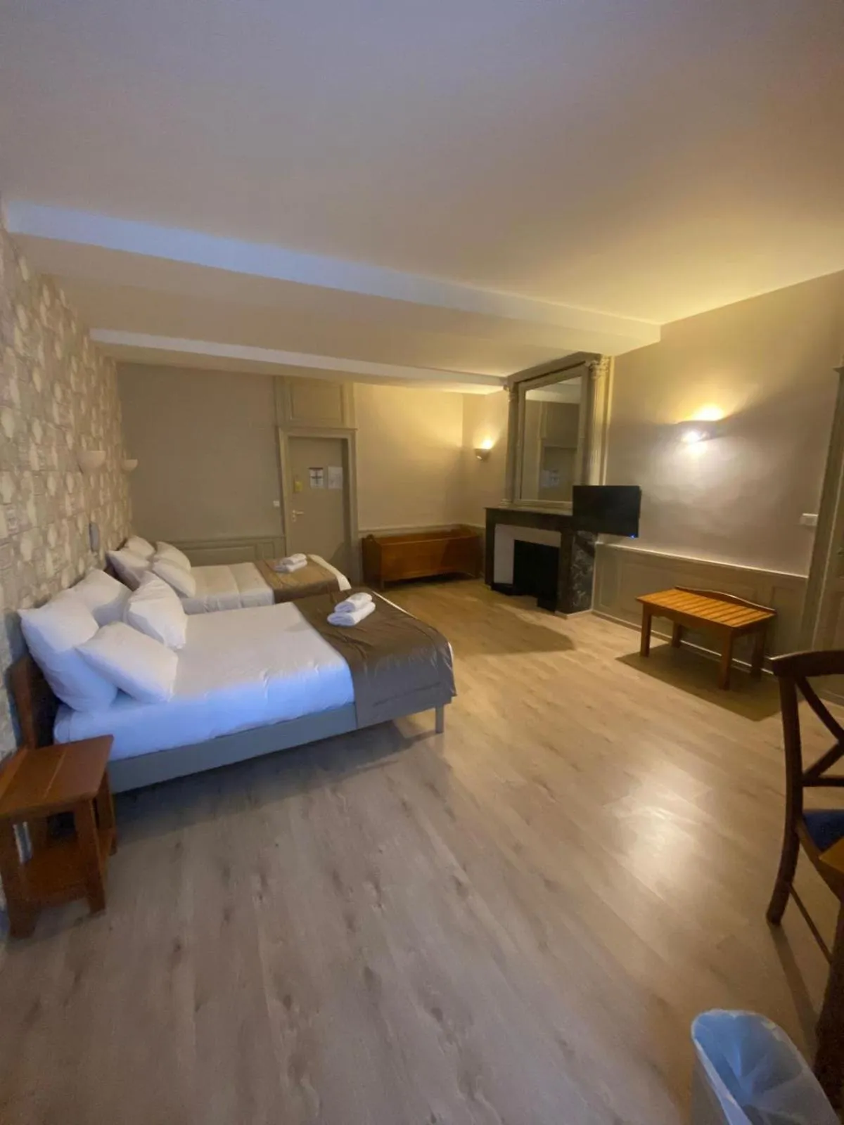 Bed in Logis Grand Hôtel De L'Europe