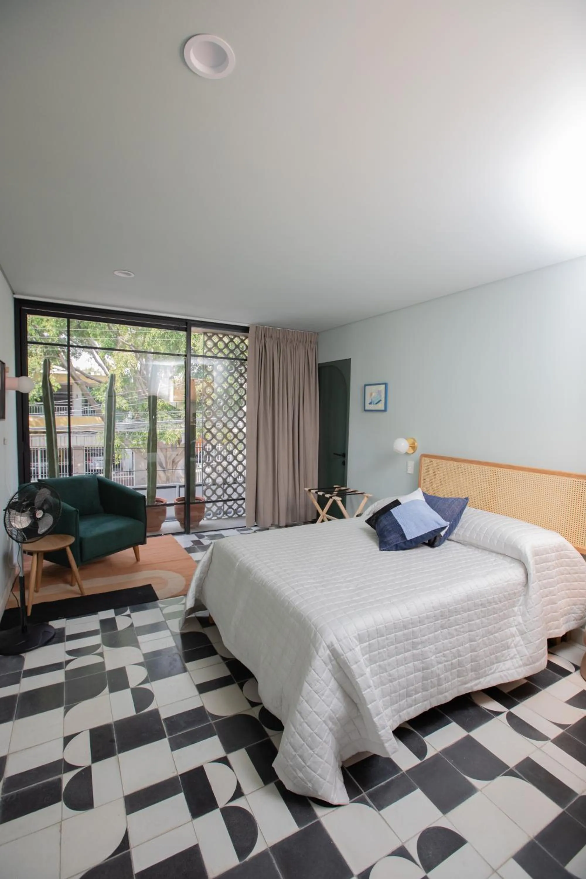 Bed in Casa Ixaya by Barrio México