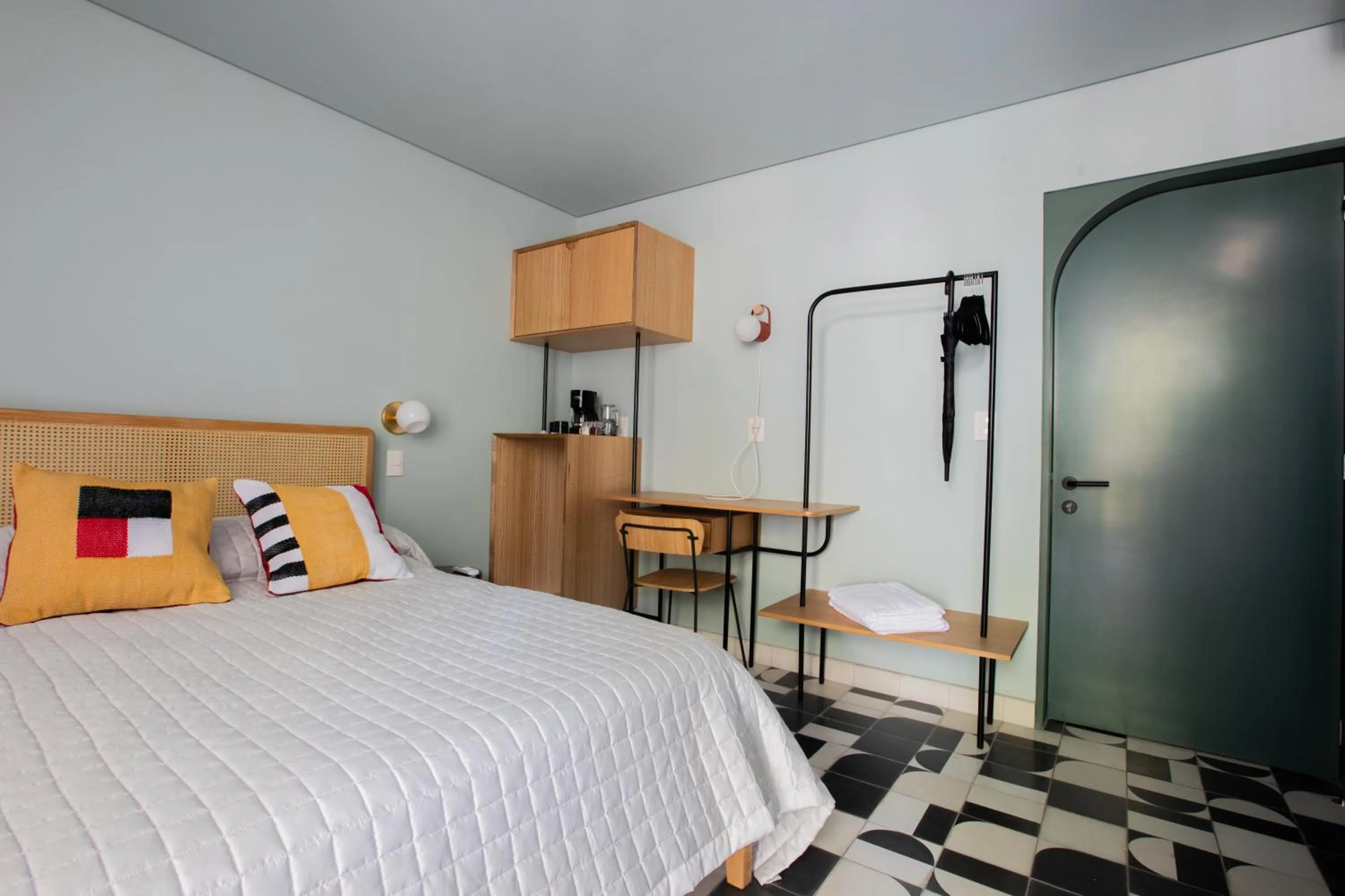 Bed in Casa Ixaya by Barrio México