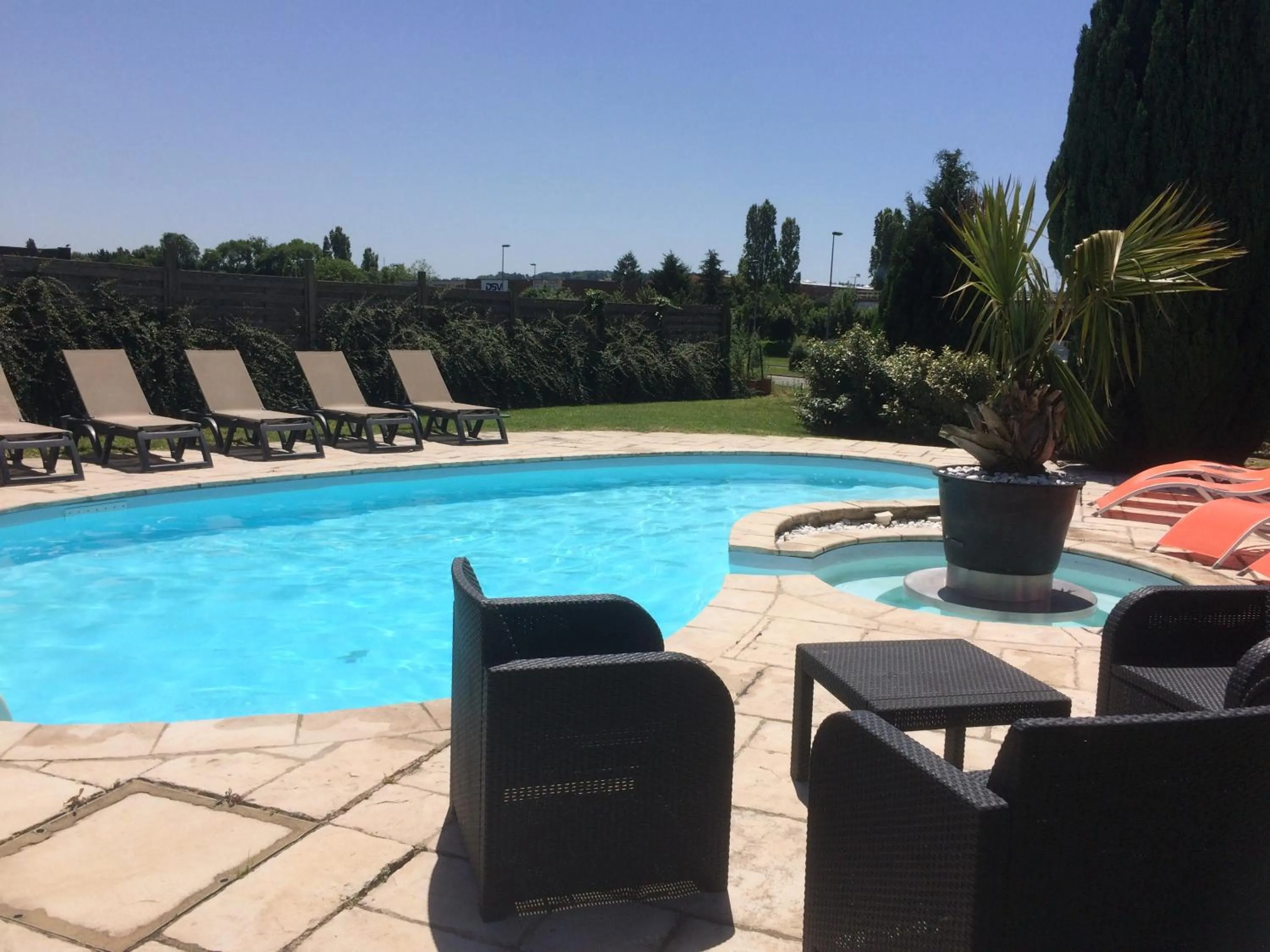 Pool view in La Roselière