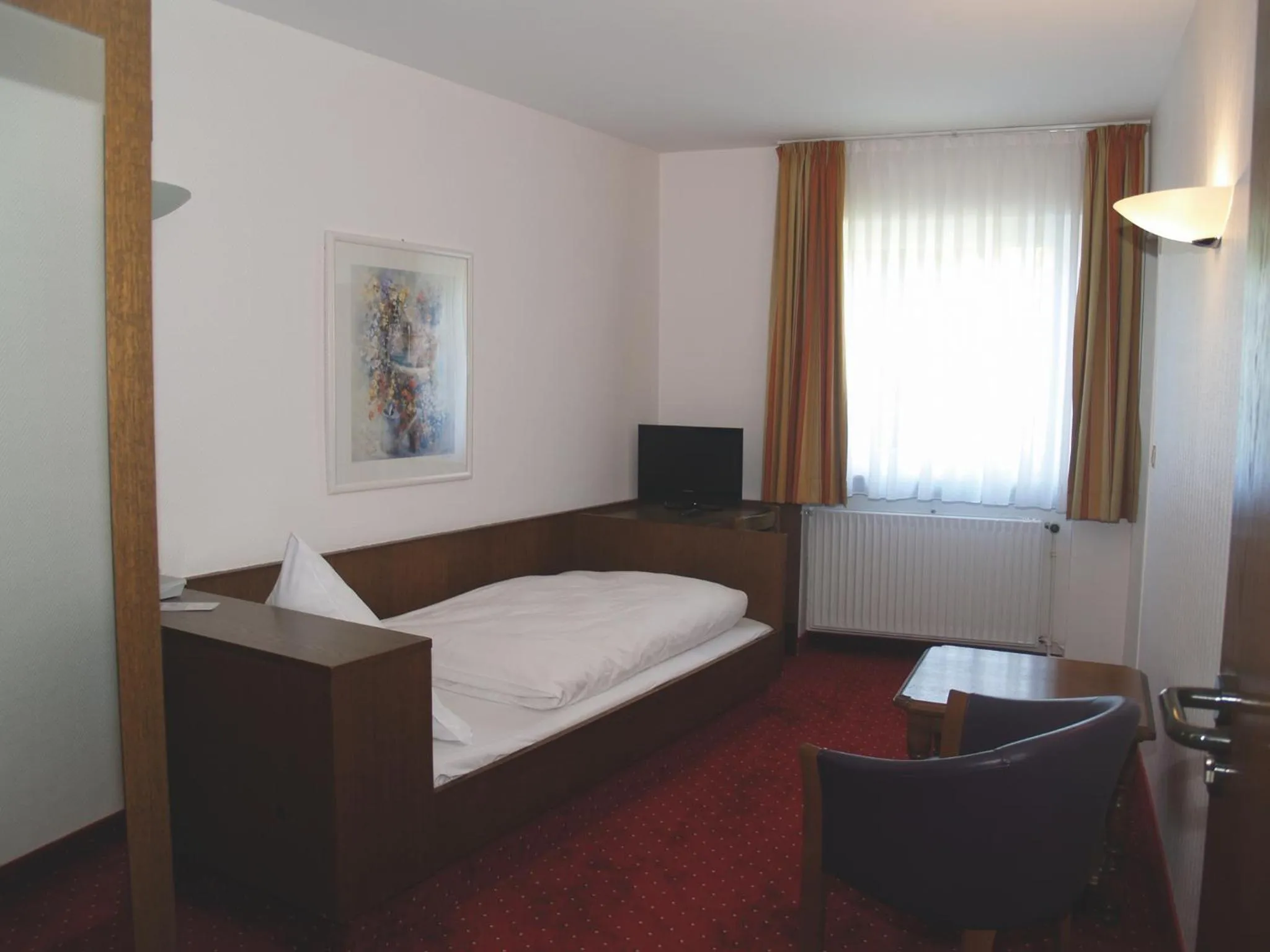 Photo of the whole room, Bed in Hotel Felsenkeller