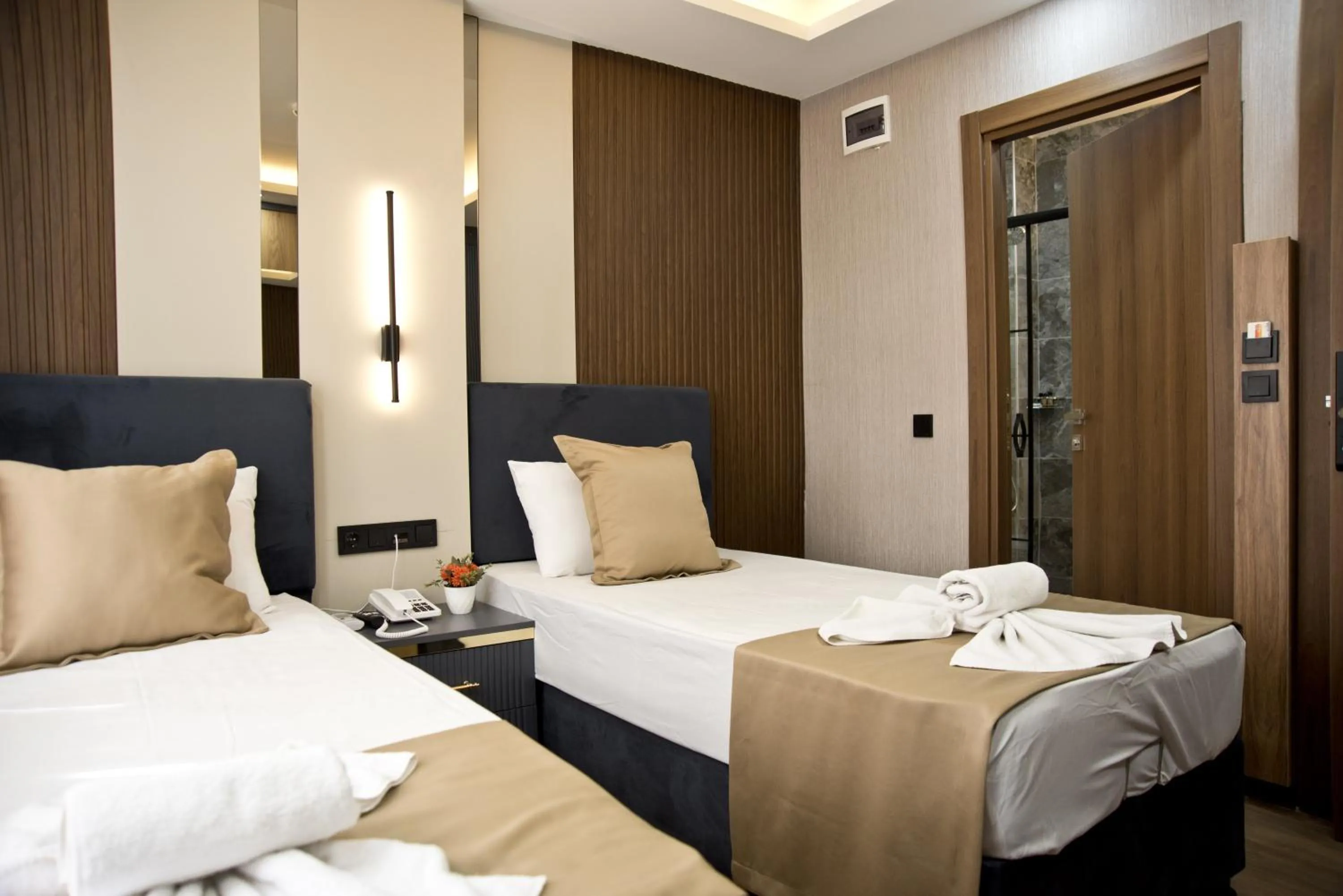 Photo of the whole room, Bed in Grand Bagoz Hotel