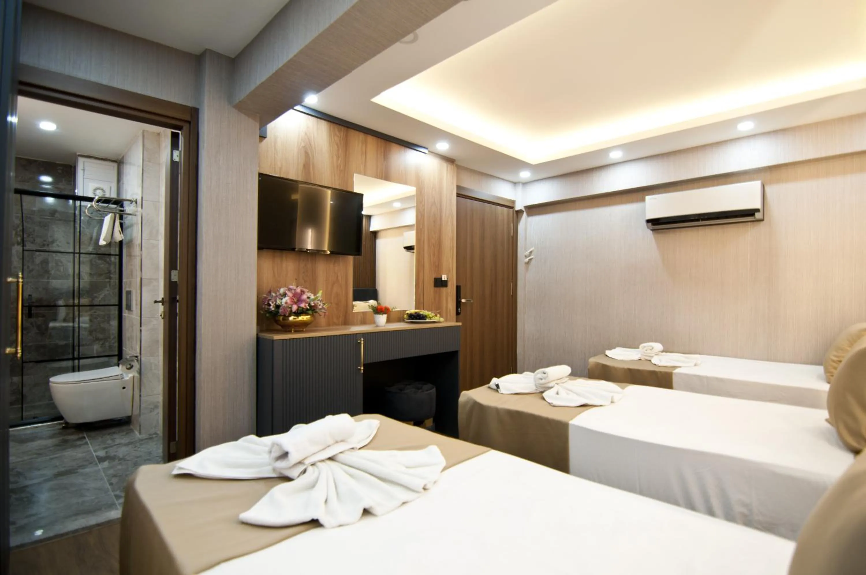 Photo of the whole room, Bed in Grand Bagoz Hotel