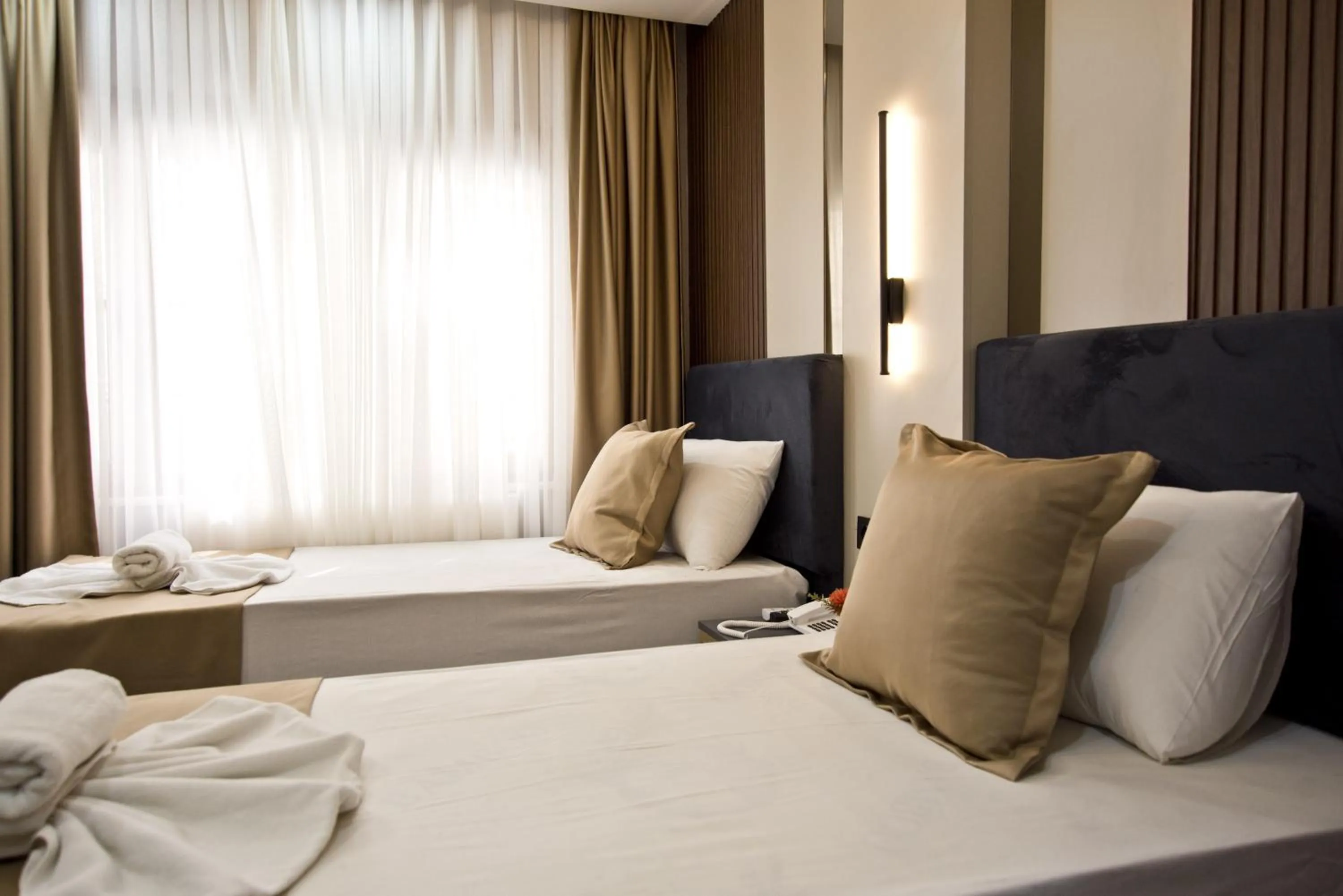 Photo of the whole room, Bed in Grand Bagoz Hotel