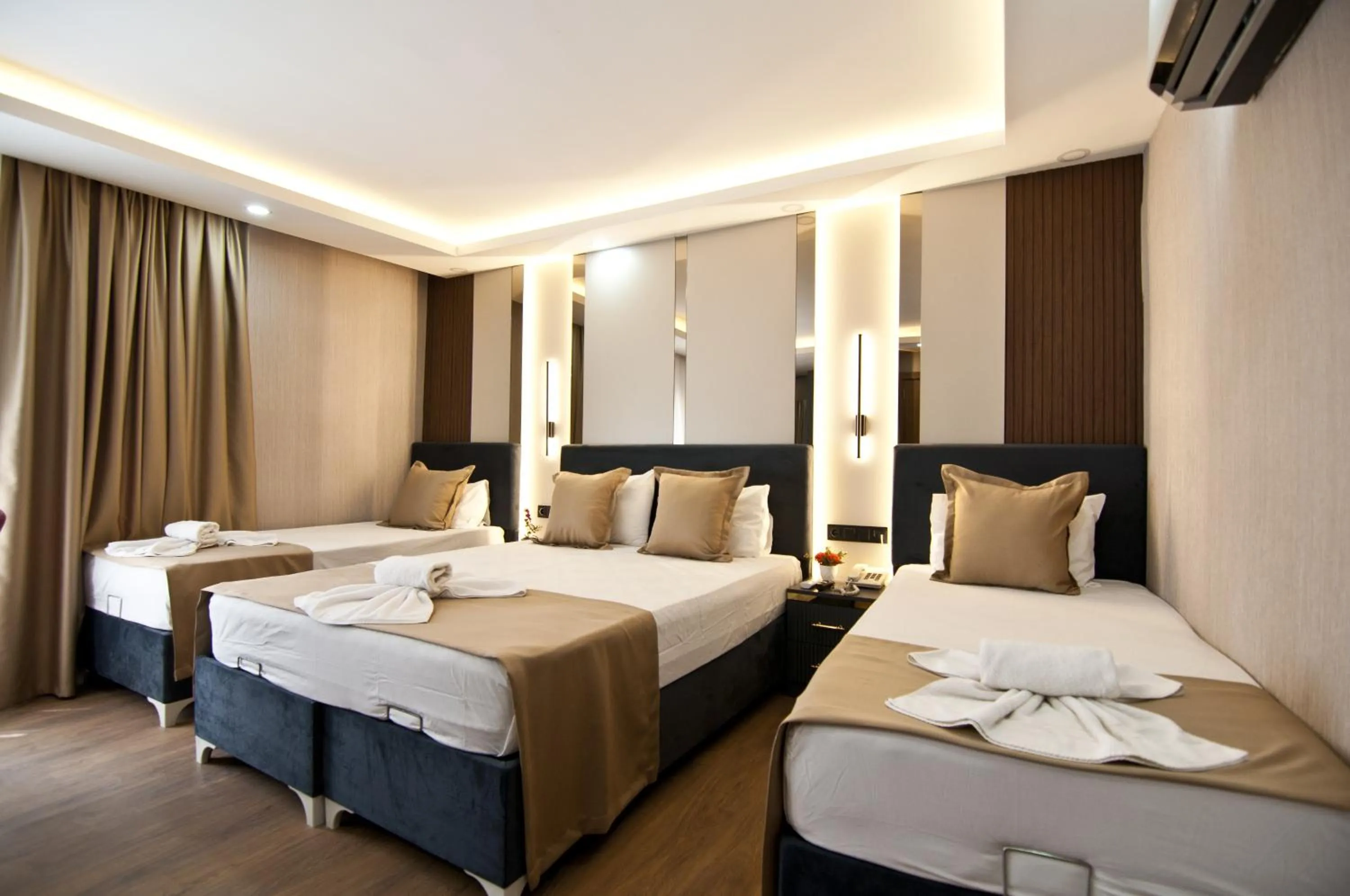 Photo of the whole room, Bed in Grand Bagoz Hotel