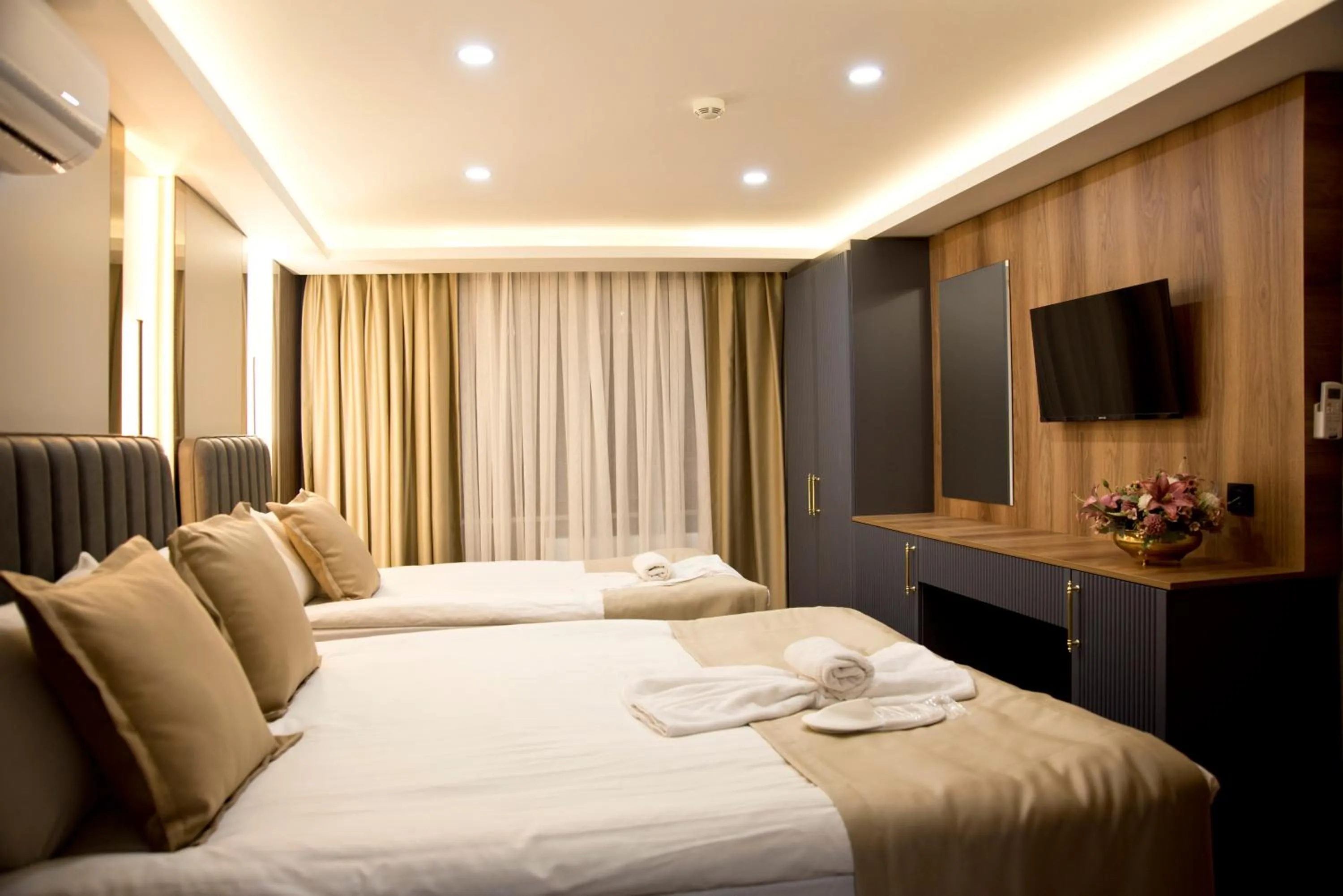 Photo of the whole room, Bed in Grand Bagoz Hotel