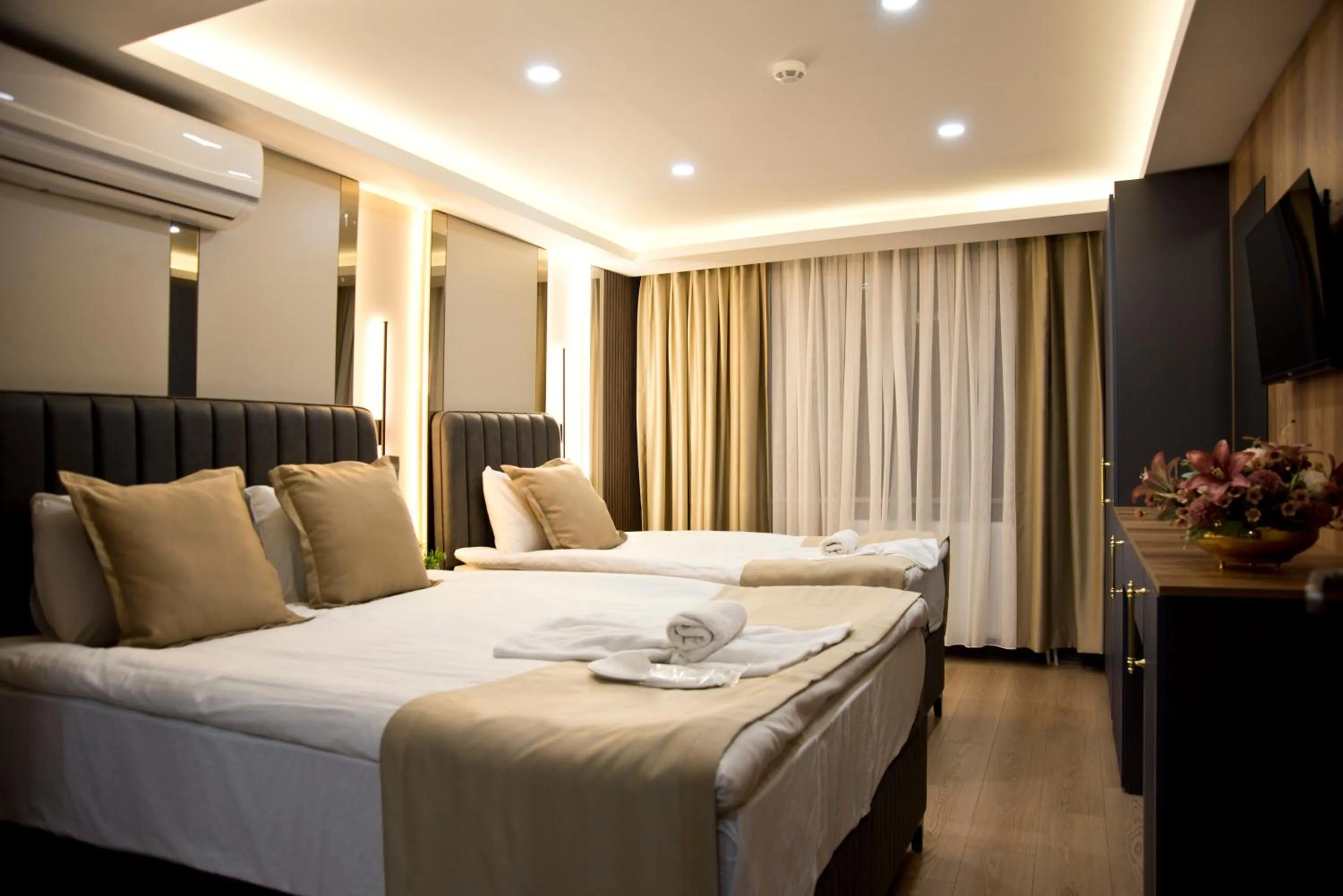 Photo of the whole room, Bed in Grand Bagoz Hotel