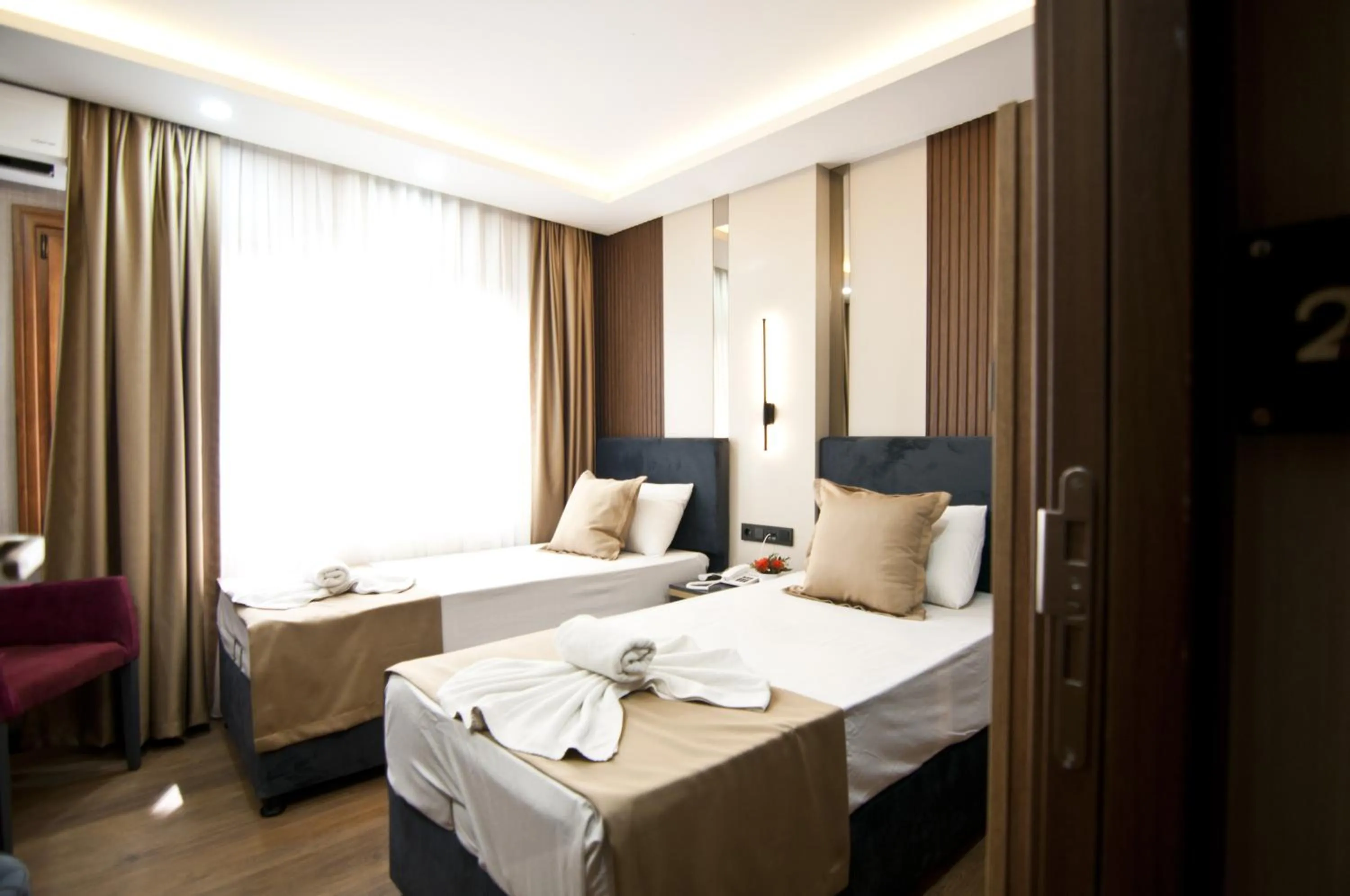 Photo of the whole room, Bed in Grand Bagoz Hotel