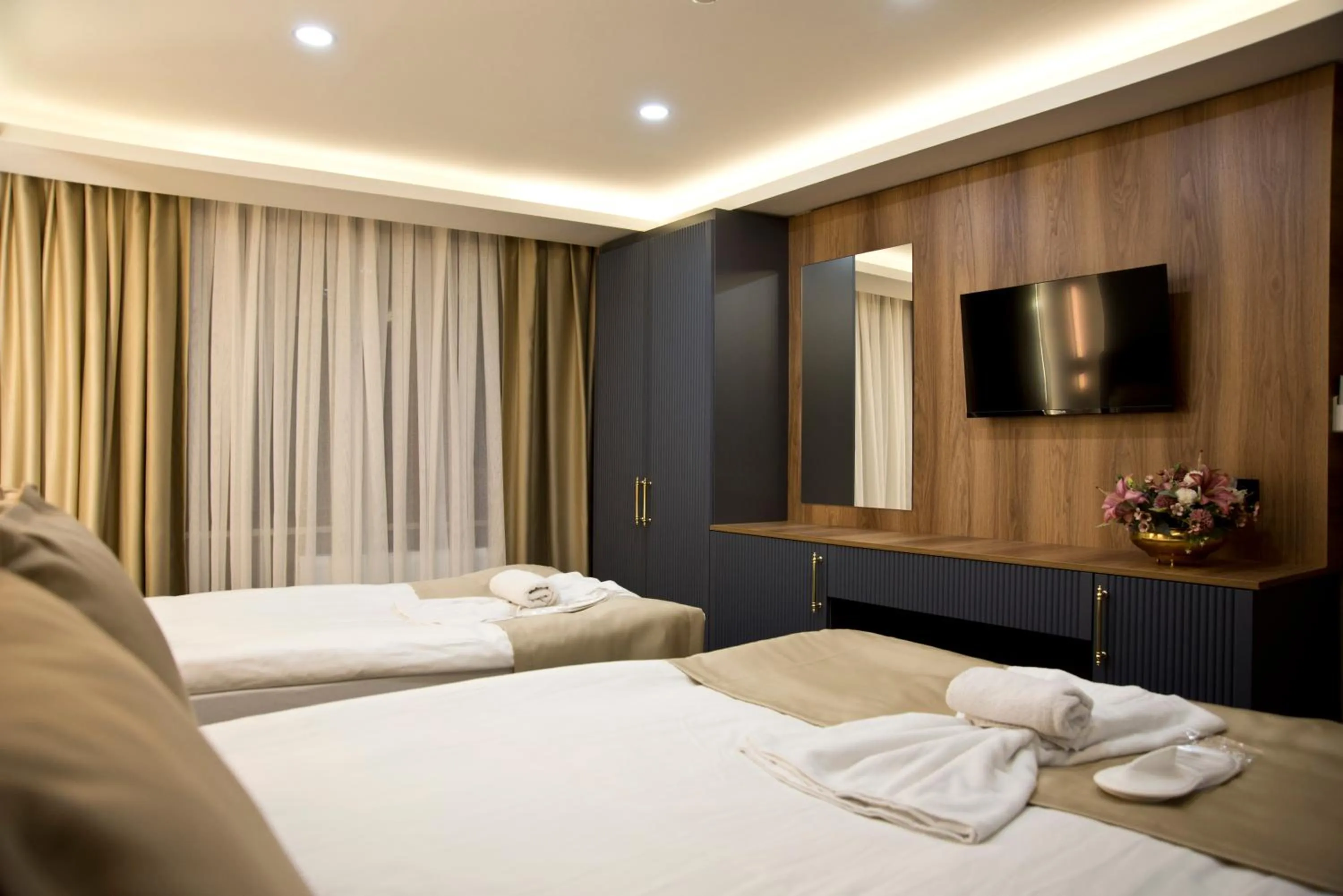 Photo of the whole room, Bed in Grand Bagoz Hotel