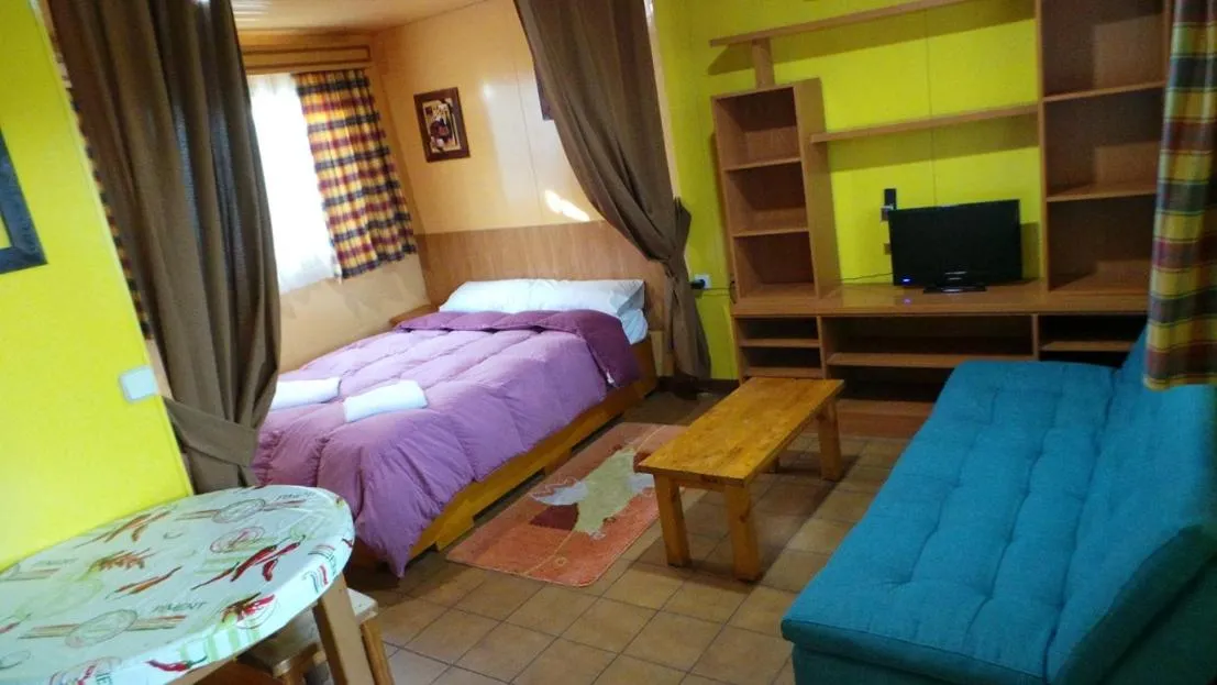 Bed in Bungalows Alpha