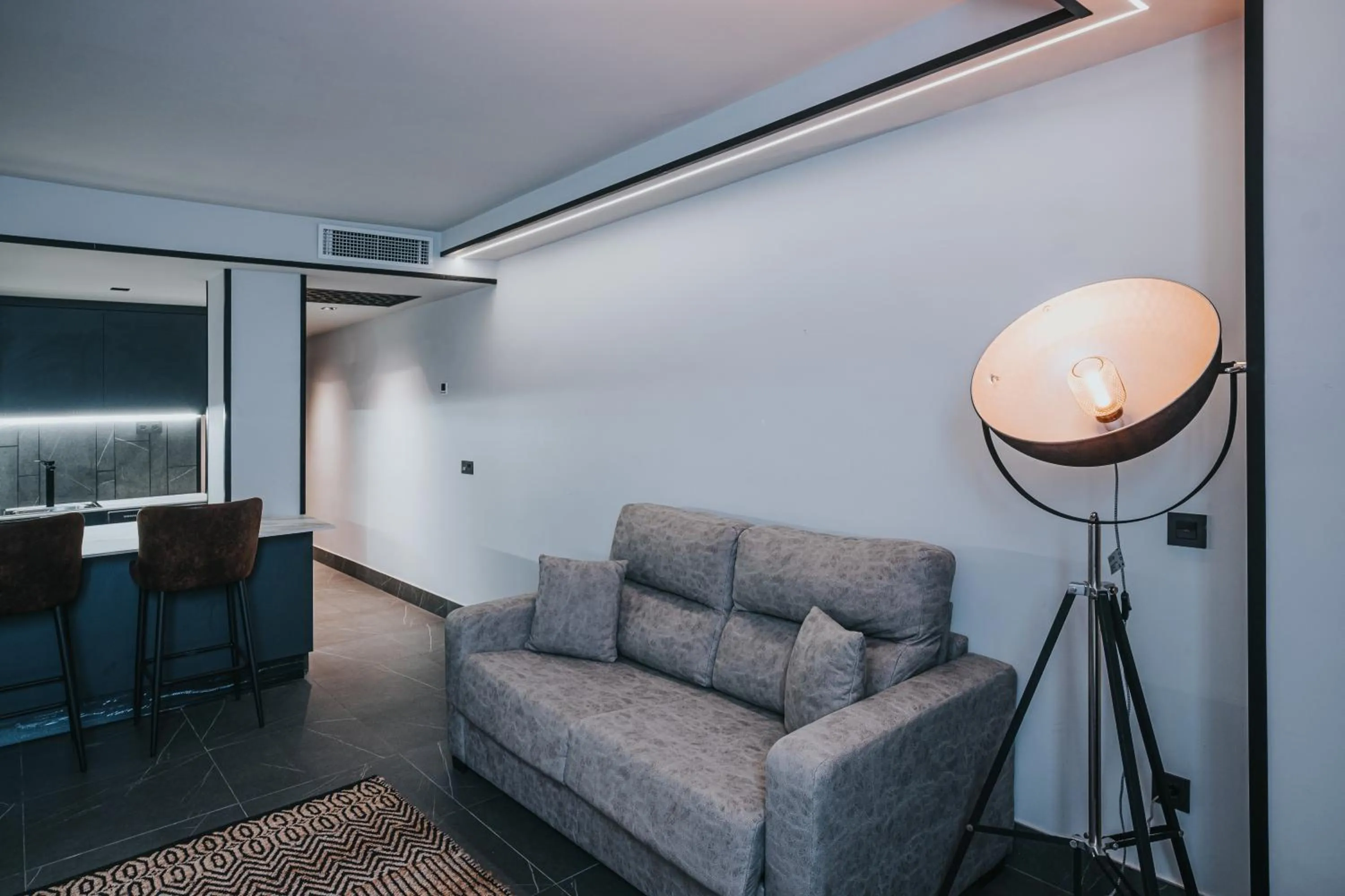 Living room in Poem Suites, Las Canteras